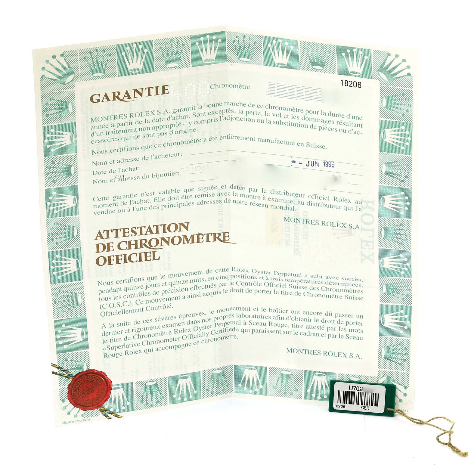 The image shows an open warranty and chronometer certificate for the Rolex President 18206 Men's Platinum Blue Dial 18206 Men's Platinum Blue Dial model, including a tag and seal.