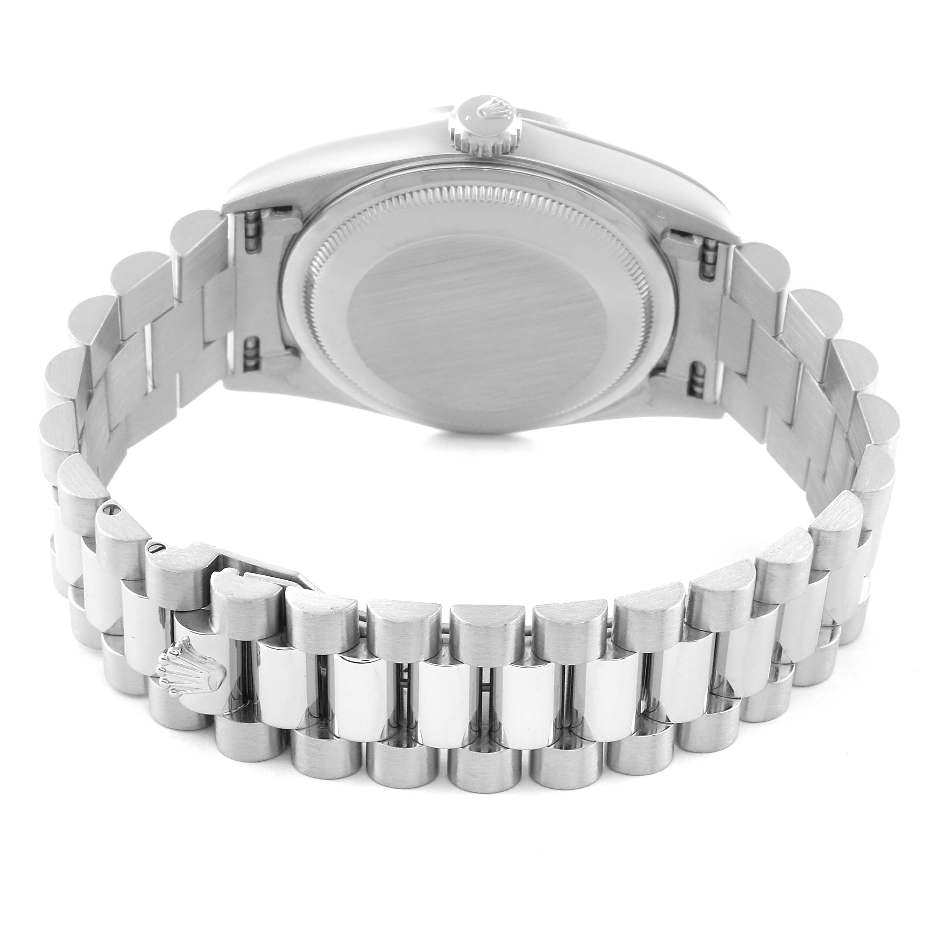 The image shows the backside and bracelet of a Rolex President 18206 Men's Platinum Blue Dial 18206 Men's Platinum Blue Dial model watch.