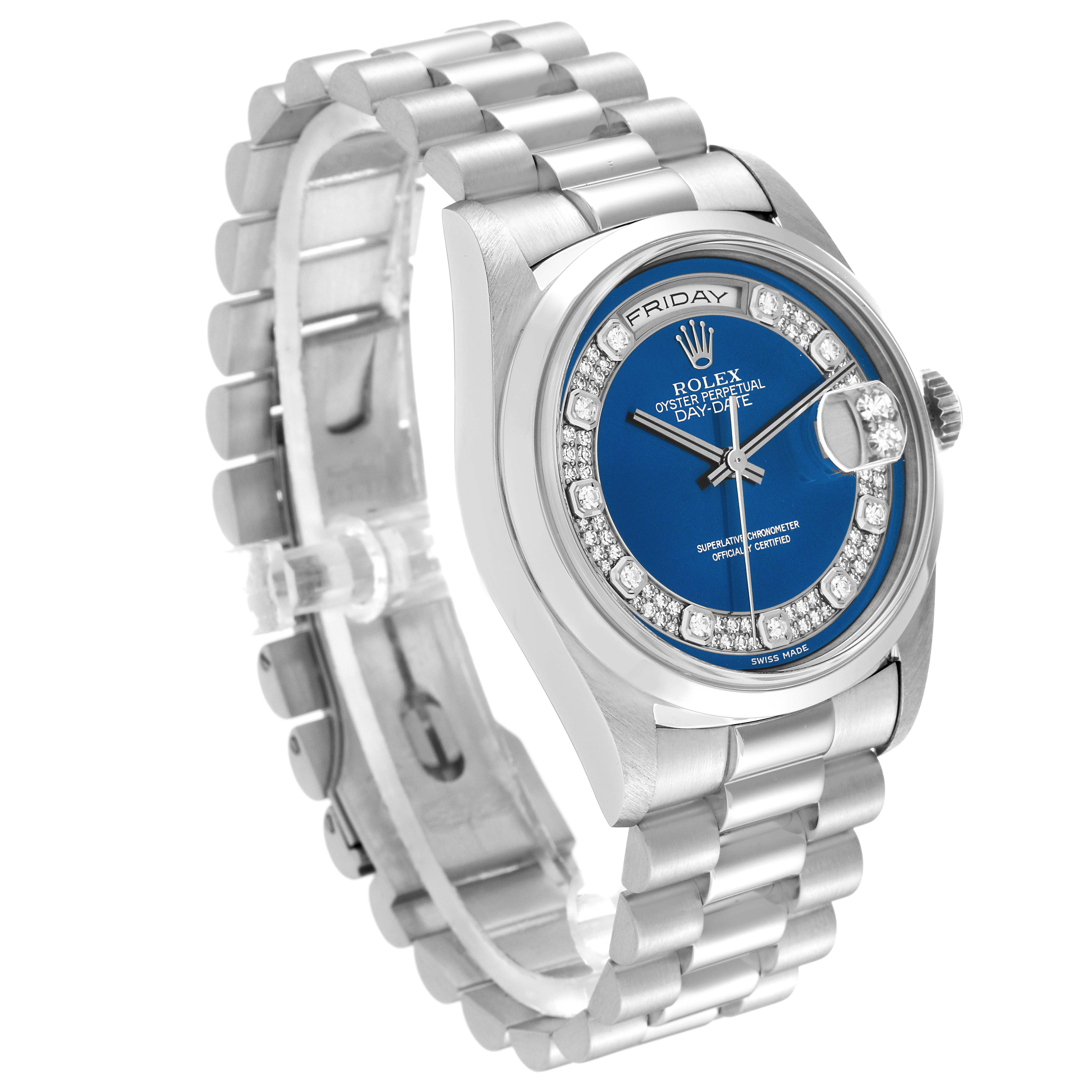 The image shows a Rolex President 18206 Men's Platinum Blue Dial 18206 Men's Platinum Blue Dial model watch from a three-quarter angle, displaying its bracelet, bezel, and blue dial.