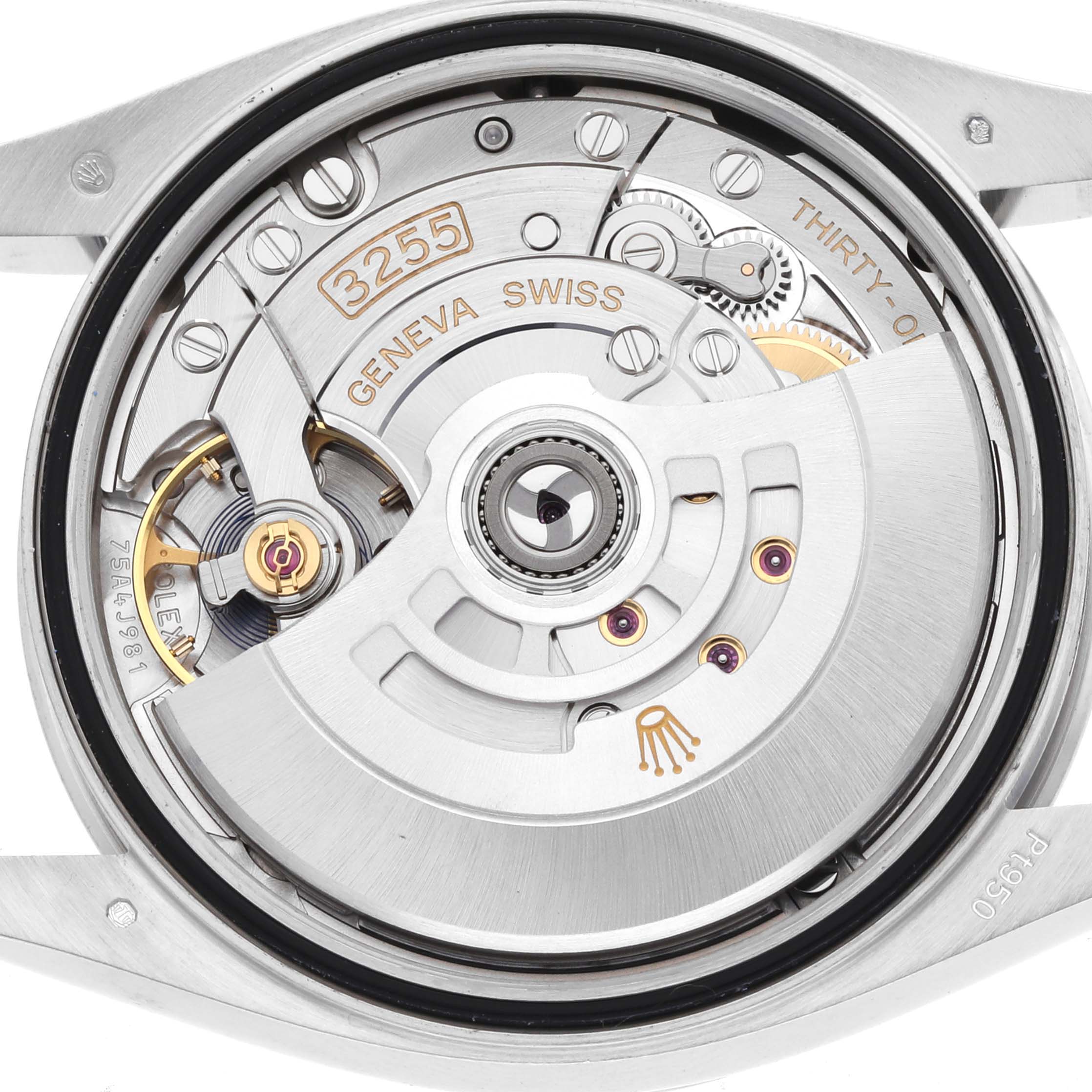 This image shows the back of a Rolex President 128236 Men's Platinum Blue Dial model watch, highlighting the intricate movement and mechanisms.