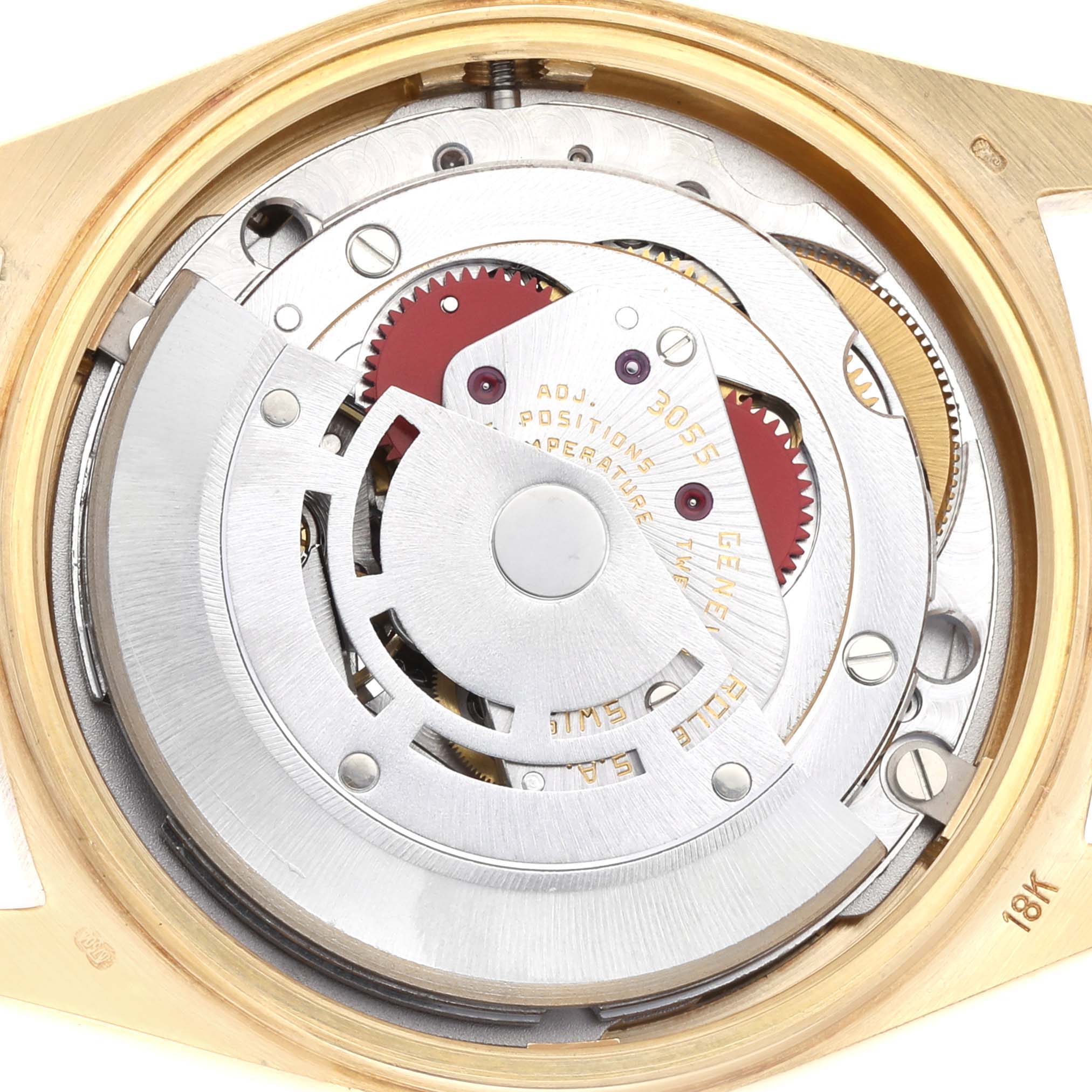 The image shows the movement mechanism of a Rolex President 18038 Men's Yellow Gold Champagne Dial 18038 Men's Yellow Gold Champagne Dial model from a top-down angle, highlighting gears and rotors.