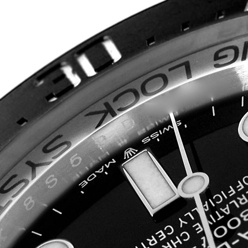 The image shows a close-up of the bezel and part of the dial of a Rolex Sea-Dweller 126660 Men
s Stainless Steel Blue Dial 126660 Men
s Stainless Steel Blue Dial watch.