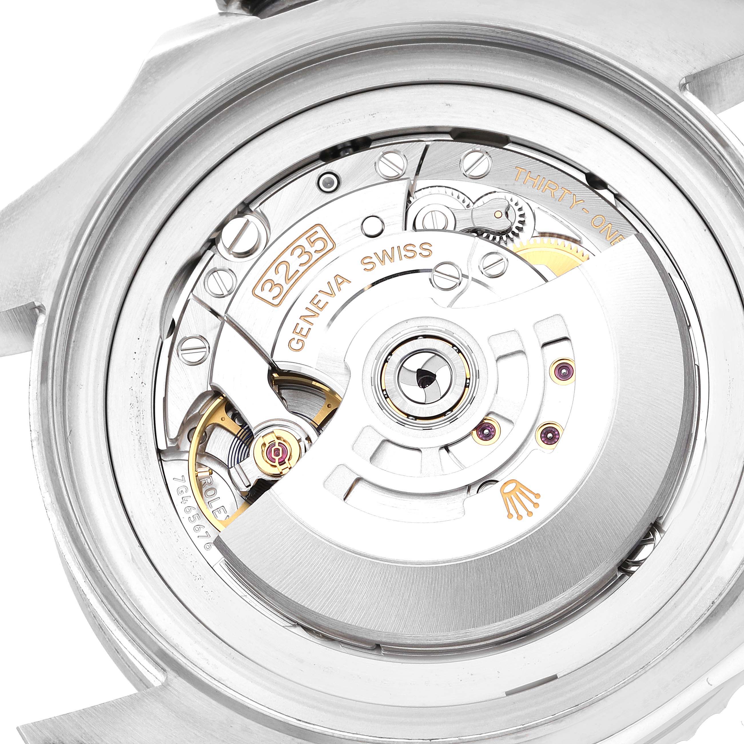 The image shows the back and internal movement mechanism of a Rolex Sea-Dweller 126660 Men
s Stainless Steel Blue Dial 126660 Men
s Stainless Steel Blue Dial watch, showcasing its intricate parts and engravings.