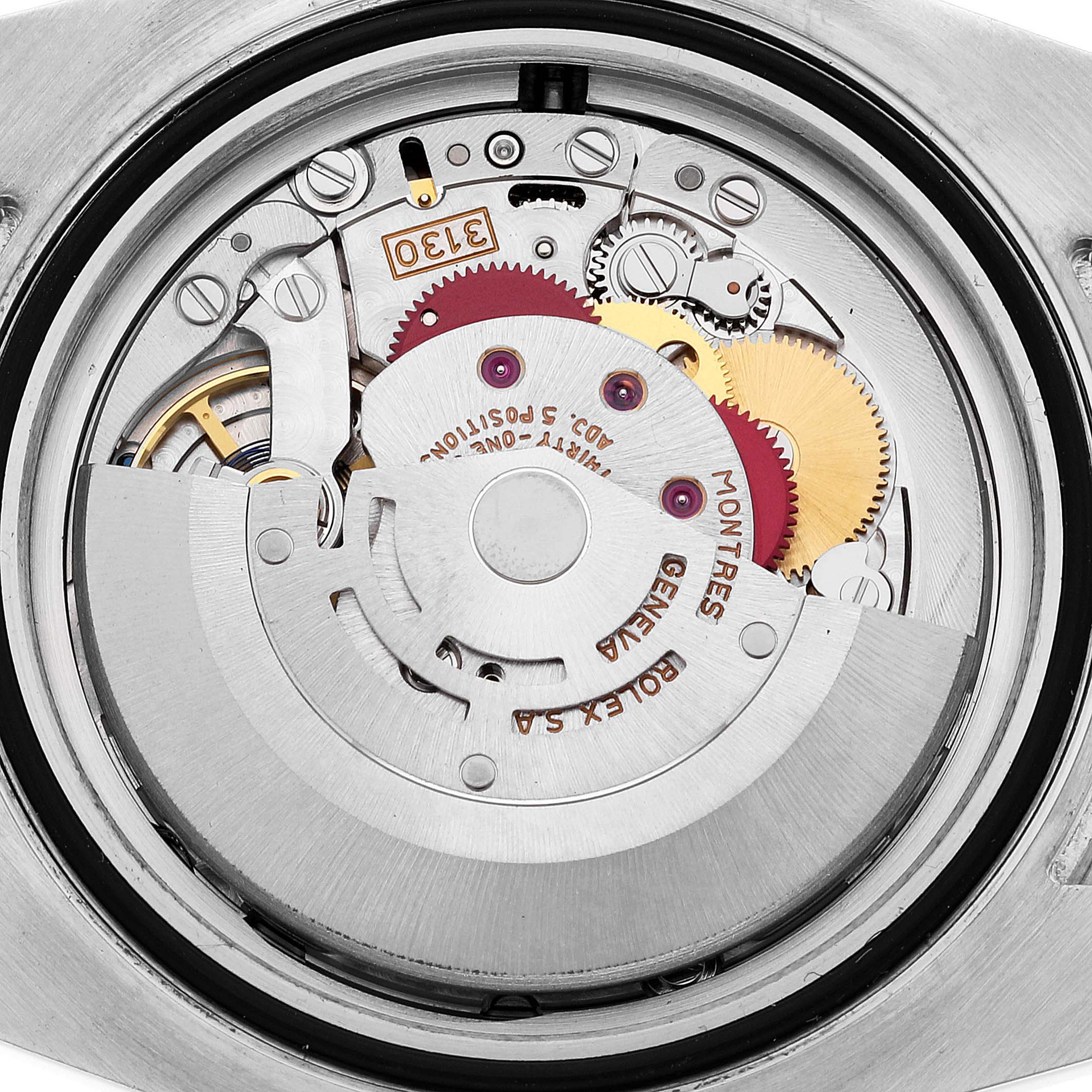 This image shows the internal mechanism of a Rolex Submariner 114060 Men's Stainless Steel Black Dial 114060 Men's Stainless Steel Black Dial watch from a direct overhead angle.