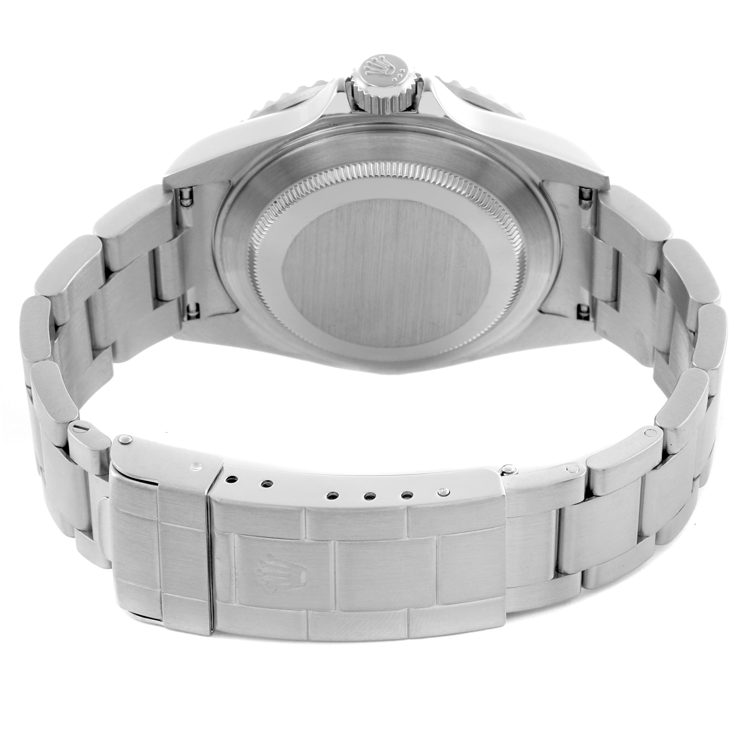 The image shows the back view of a Rolex Submariner 16610 Men's Stainless Steel Black Dial 16610 Men's Stainless Steel Black Dial, highlighting its case back and bracelet with the clasp.