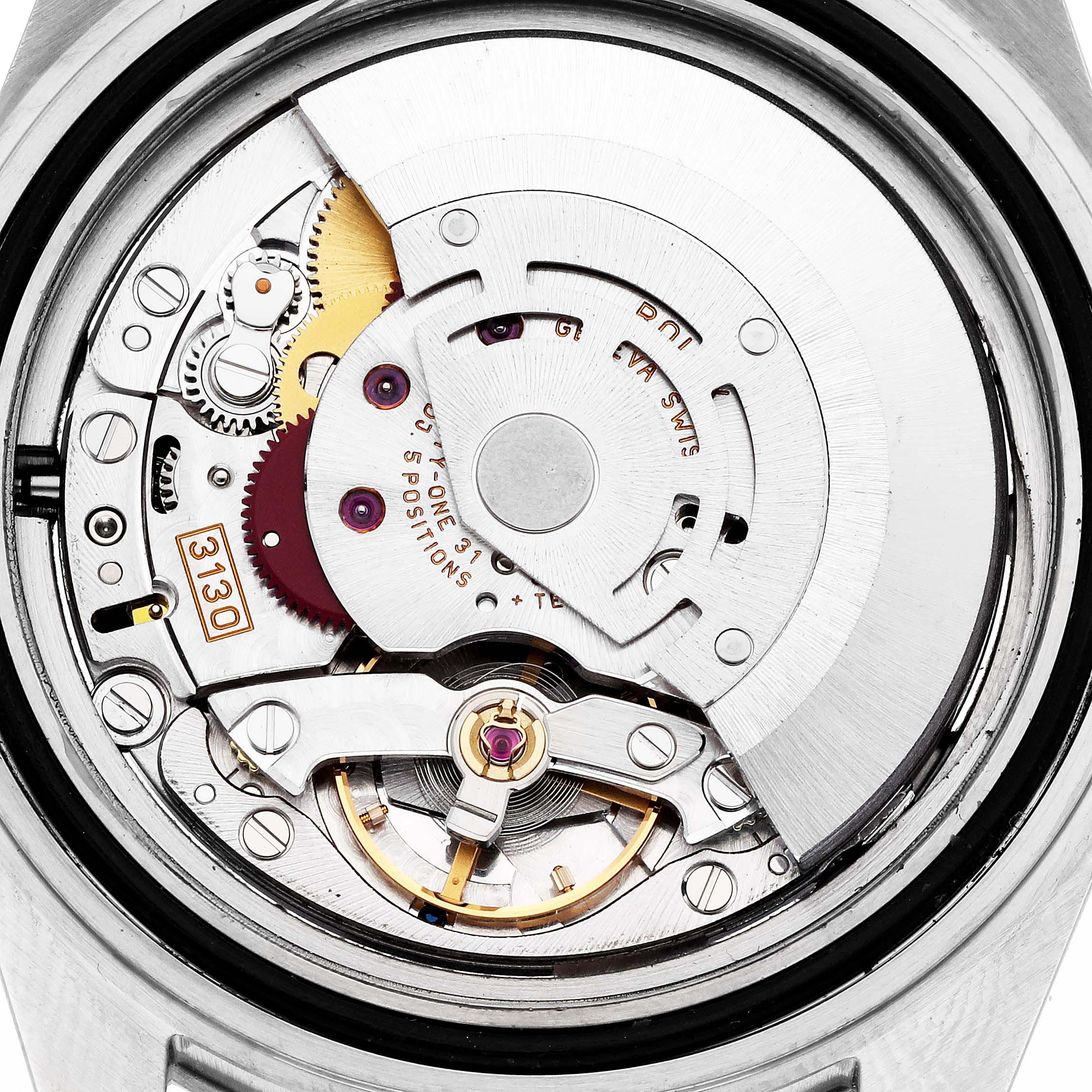 The image shows the movement mechanism of a Rolex Submariner 14060 Men's Stainless Steel Black Dial 14060 Men's Stainless Steel Black Dial watch from the back casing angle.