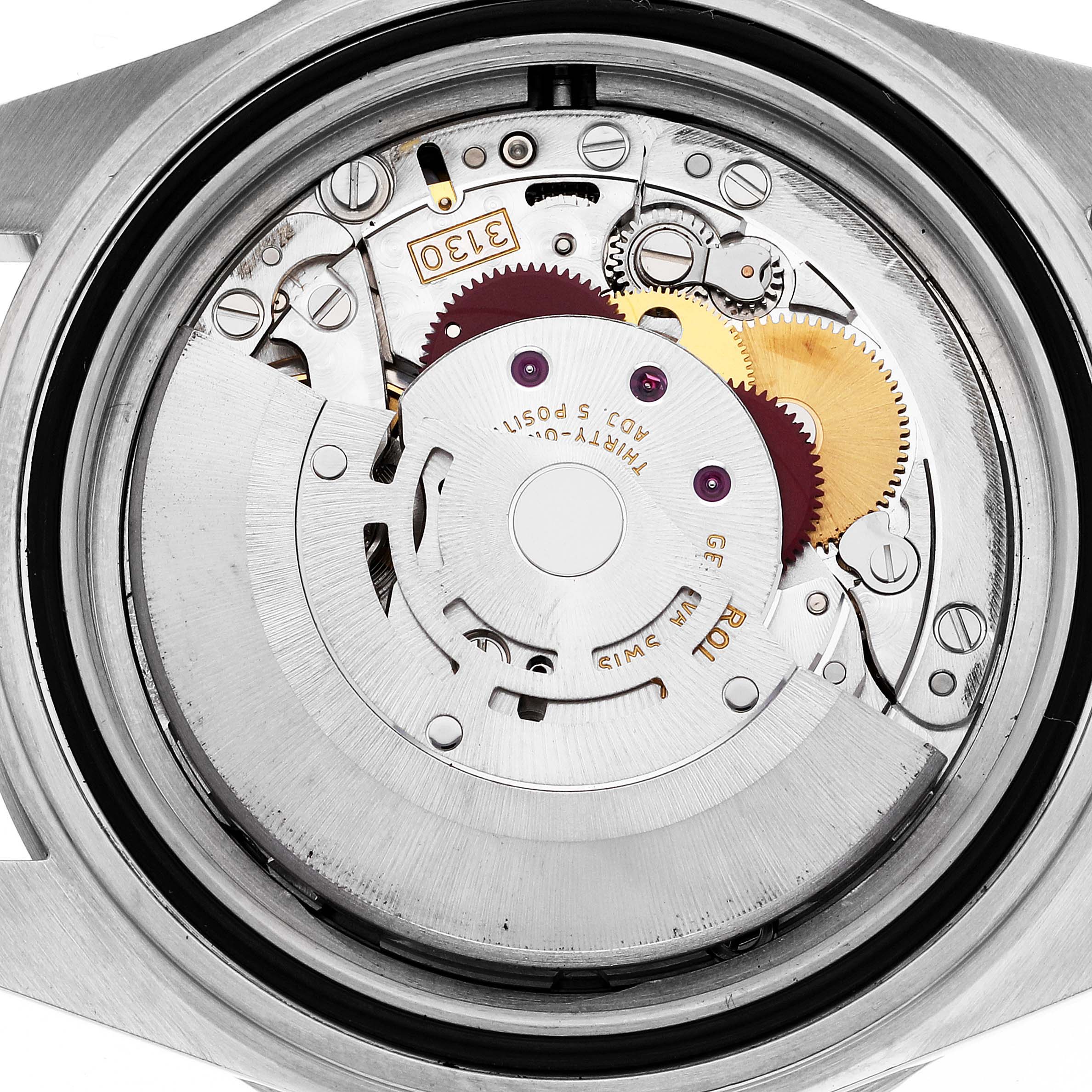 This image shows the internal mechanical parts of a Rolex Submariner 14060 Men
s Stainless Steel Black Dial 14060 Men
s Stainless Steel Black Dial watch from a top-down angle.