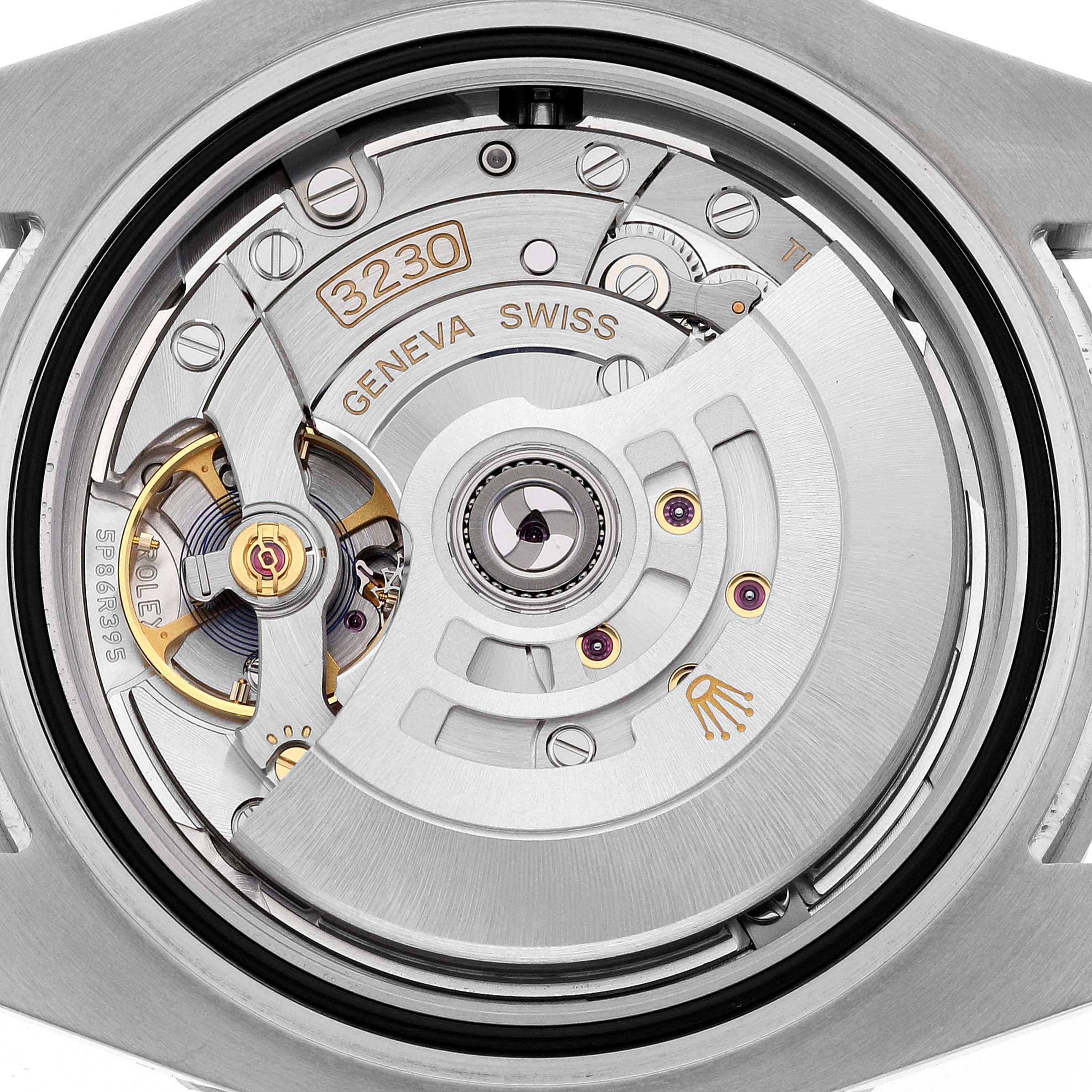 This image shows a close-up view of the movement inside the Rolex Submariner 124060 Men
s Stainless Steel Black Dial 124060 Men
s Stainless Steel Black Dial watch, specifically the 3230 caliber.