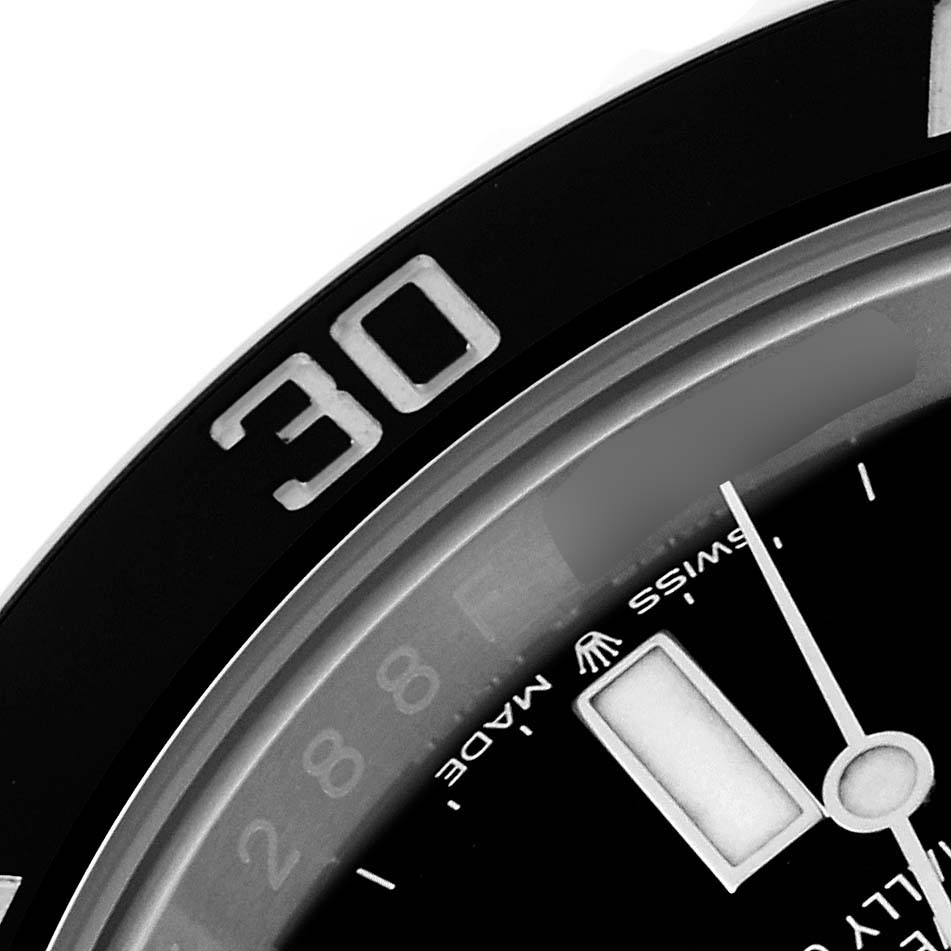 The image shows a close-up of the bezel and dial of a Rolex Submariner 124060 Men
s Stainless Steel Black Dial 124060 Men
s Stainless Steel Black Dial, highlighting the "30" marker and partial hour markers.