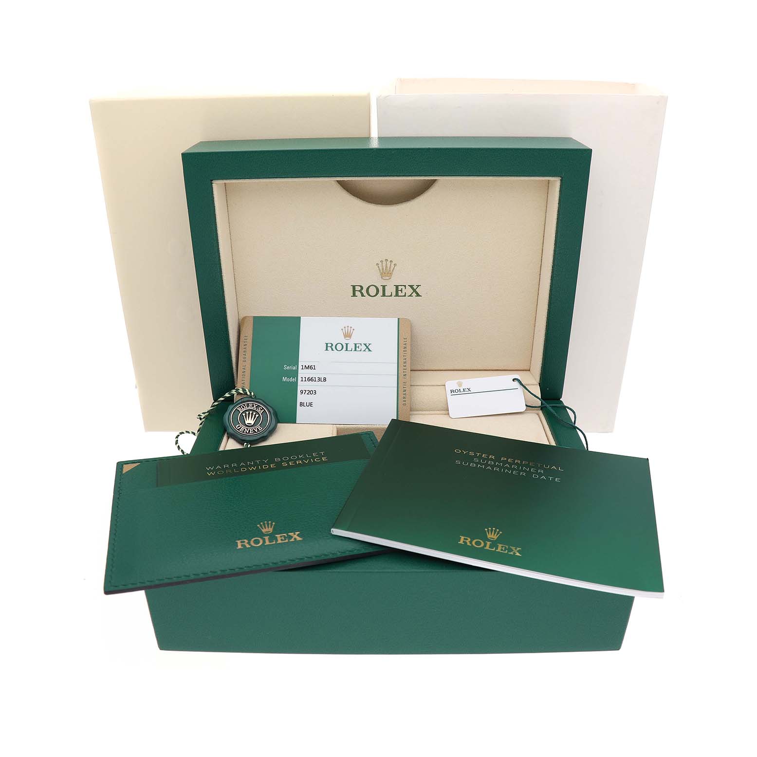 The image shows the packaging and accessories for a Rolex Submariner 116613 Men's Steel and Gold (two tone) Blue Dial, including a box, warranty card, booklets, and tag.