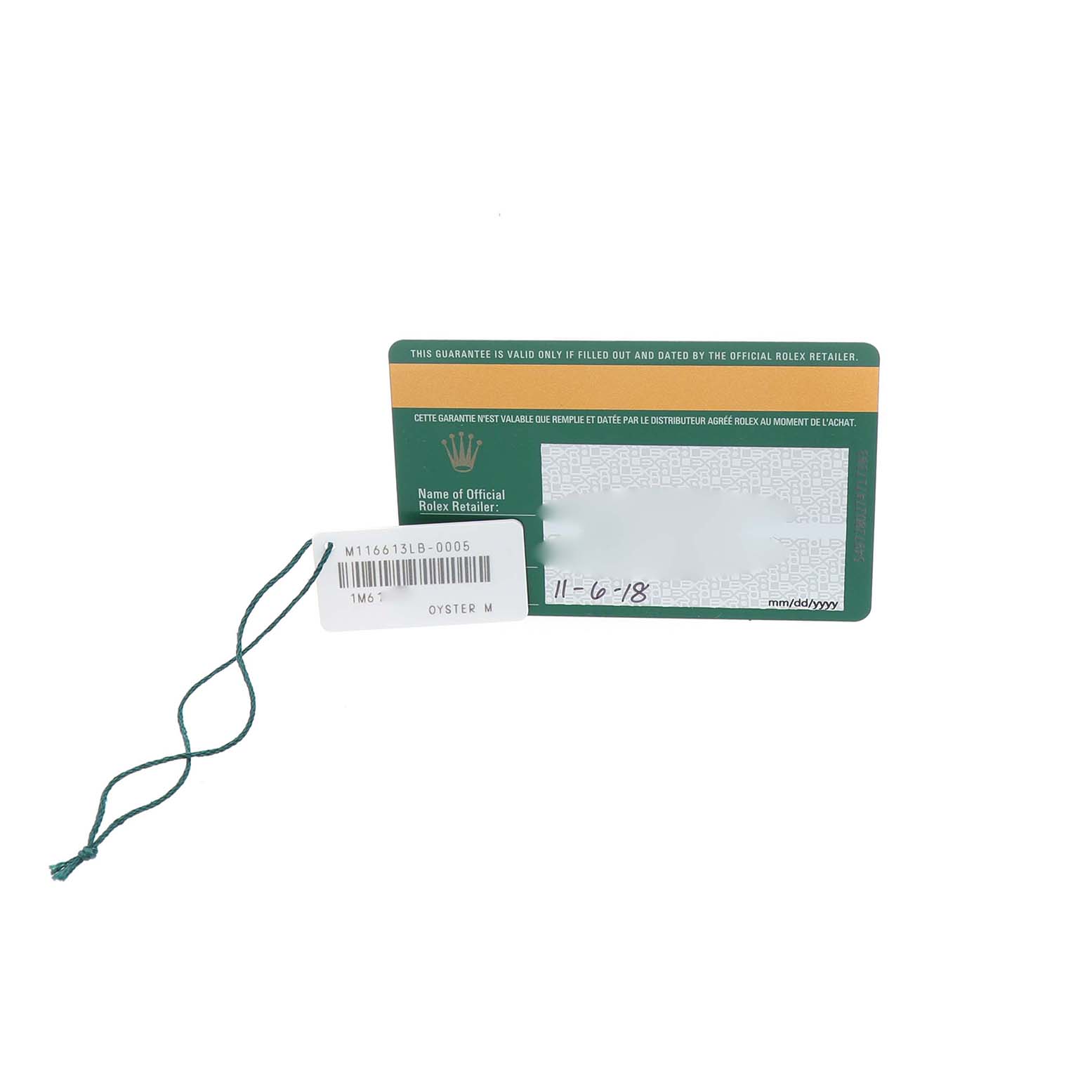 The image shows a warranty card and tag for a Rolex Submariner 116613 Men's Steel and Gold (two tone) Blue Dial watch.