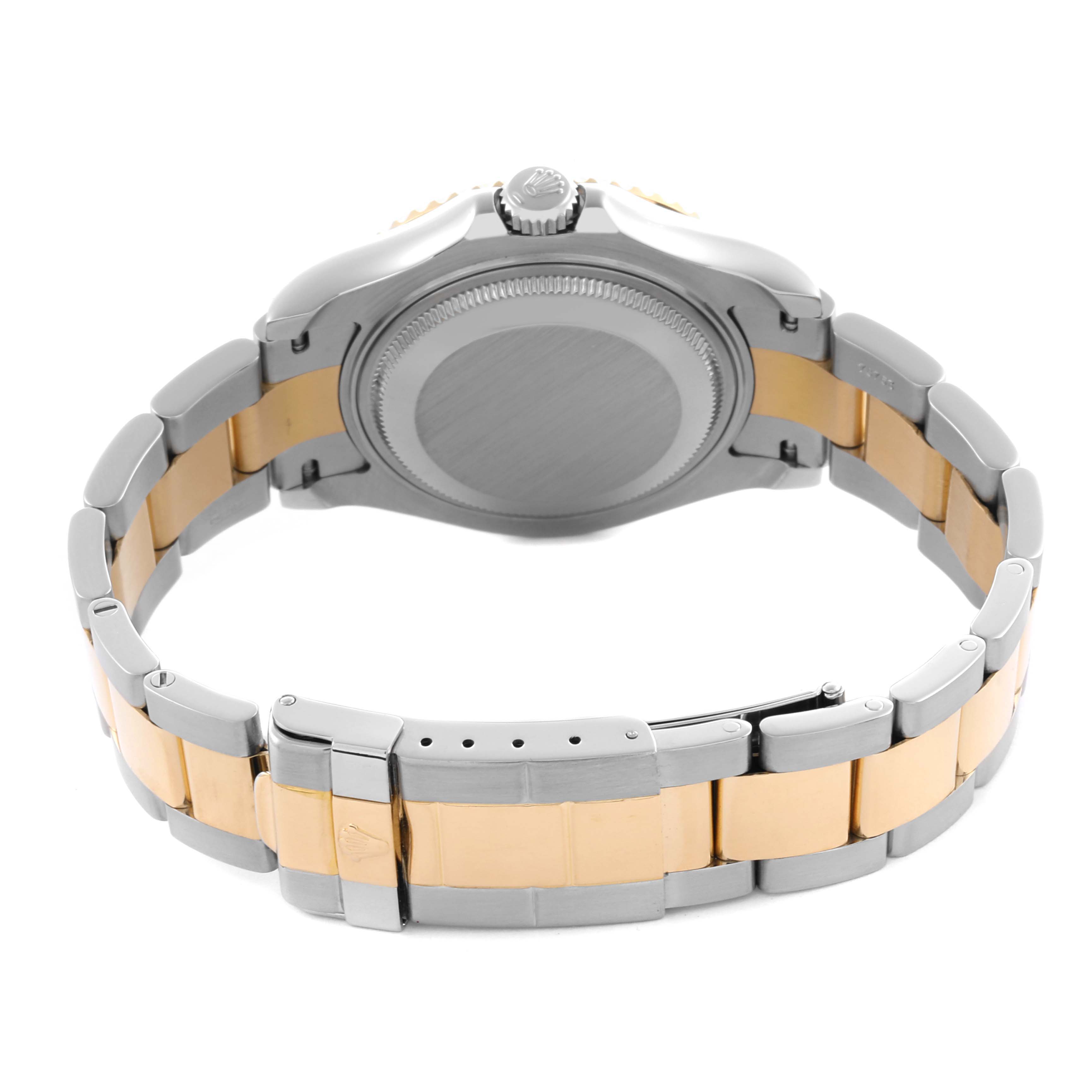 The Rolex Yacht-Master 168623 Men's Steel and Gold (two tone) Blue Dial 168623 Men's Steel and Gold (two tone) Blue Dial watch is shown from the back, displaying the case back, crown, and two-tone bracelet.