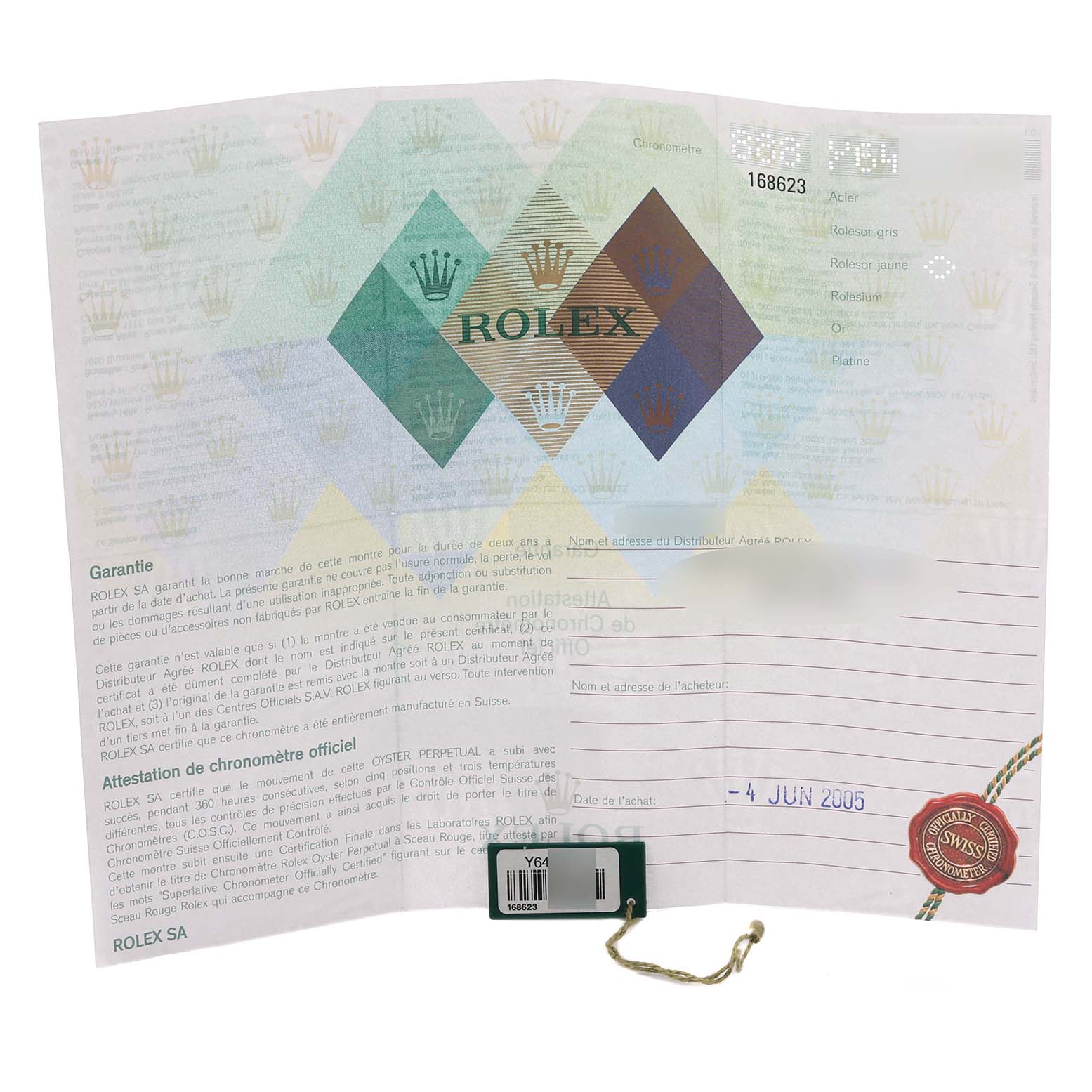 The image shows the warranty certificate and tag for a Rolex Yacht-Master 168623 Men's Steel and Gold (two tone) Blue Dial 168623 Men's Steel and Gold (two tone) Blue Dial watch.