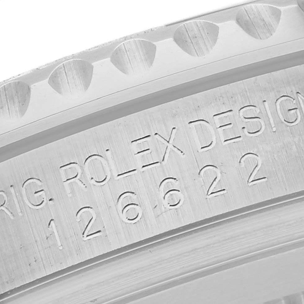 The image shows a close-up angle of the Rolex Yacht-Master 126622 Men's Stainless Steel Grey Dial 126622 Men's Stainless Steel Grey Dial model, specifically the etched serial number and part of the bezel.