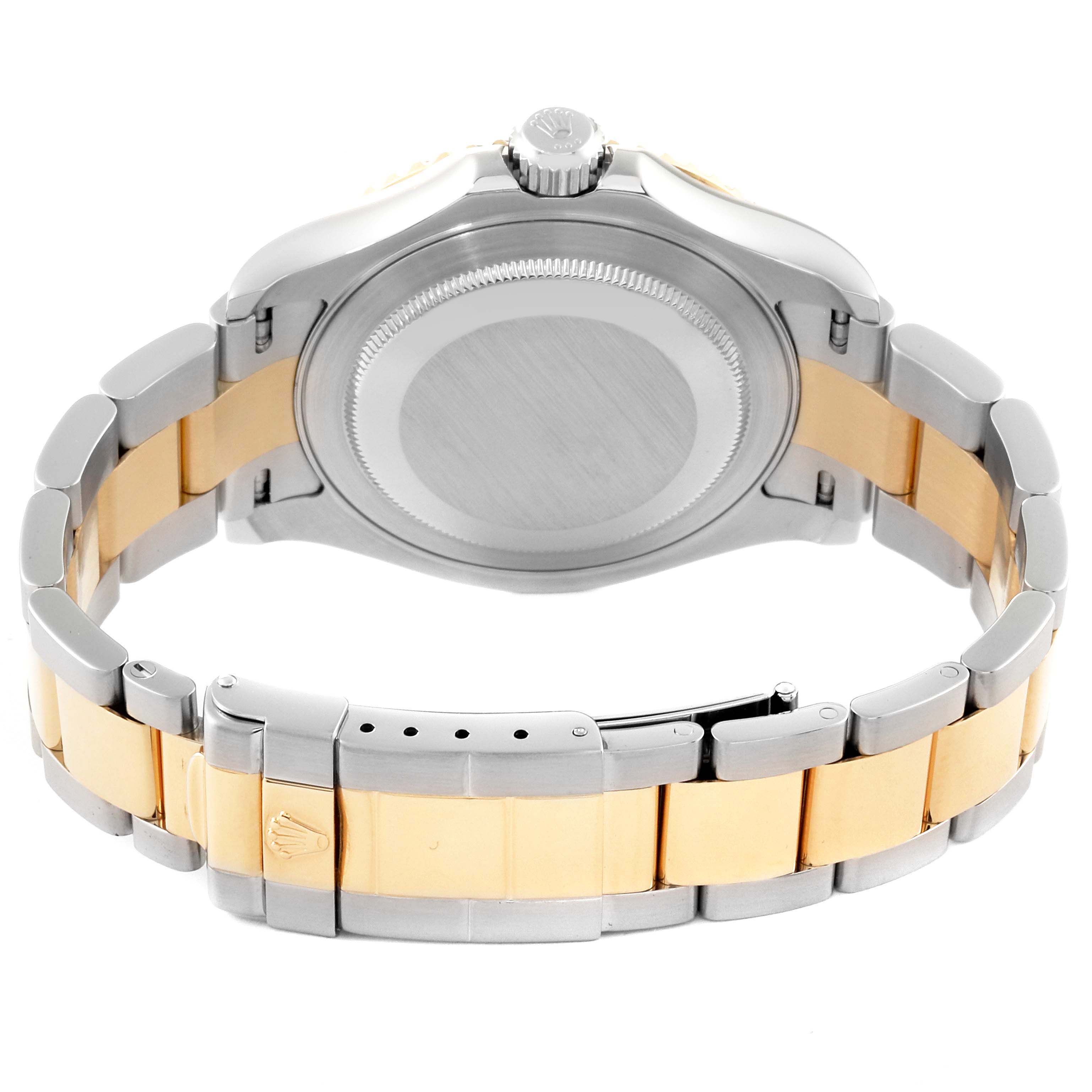 The image shows the back view of a Rolex Yacht-Master 16623 Men's Steel and Gold (two tone) Grey Dial 16623 Men's Steel and Gold (two tone) Grey Dial watch, focusing on the case back and gold-and-silver bracelet.