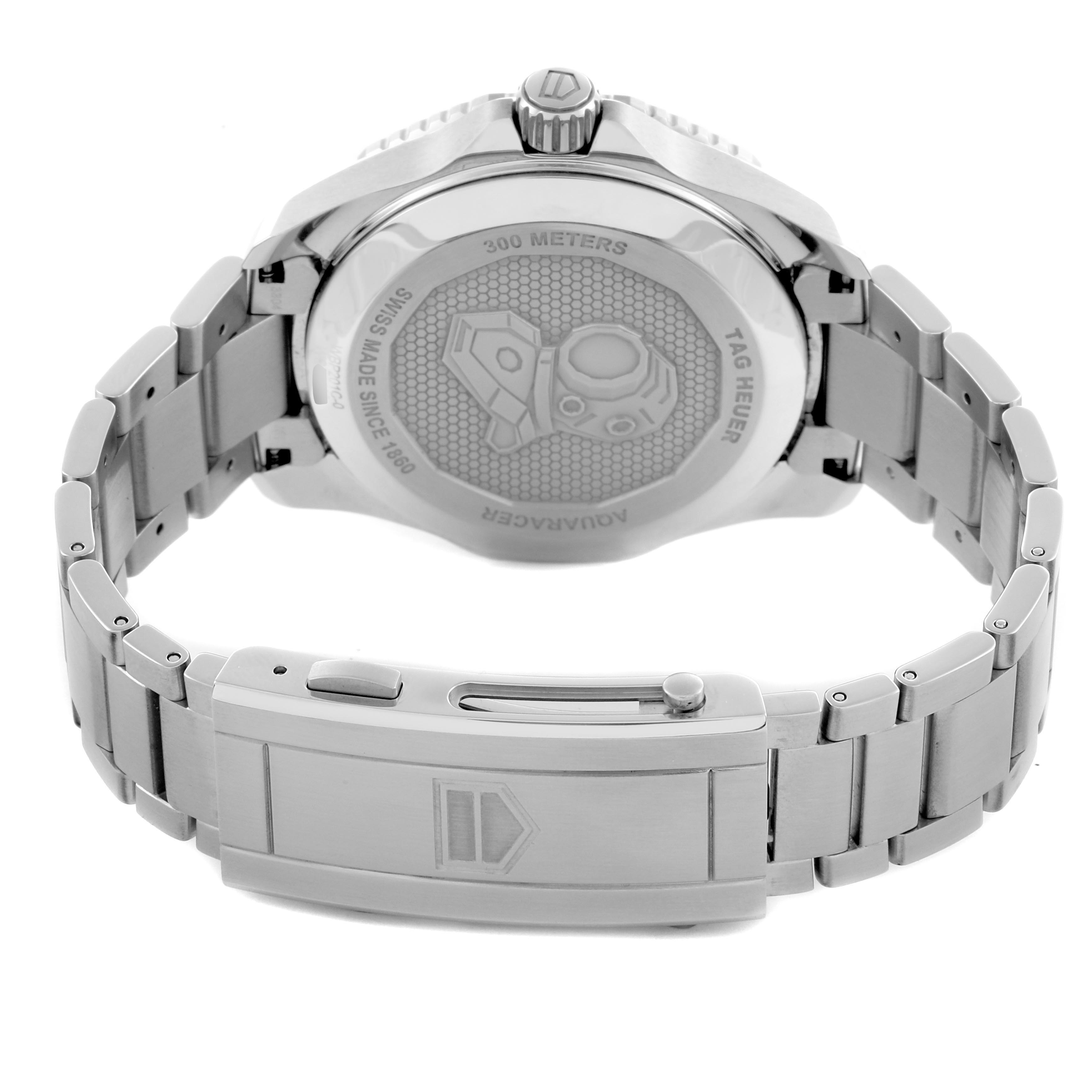 The image shows the back and clasp of a Tag Heuer Aquaracer WBP201C.BA0632 Men's Stainless Steel Silver Dial WBP201C.BA0632 Men's Stainless Steel Silver Dial watch, highlighting the engraved case back and metal bracelet.