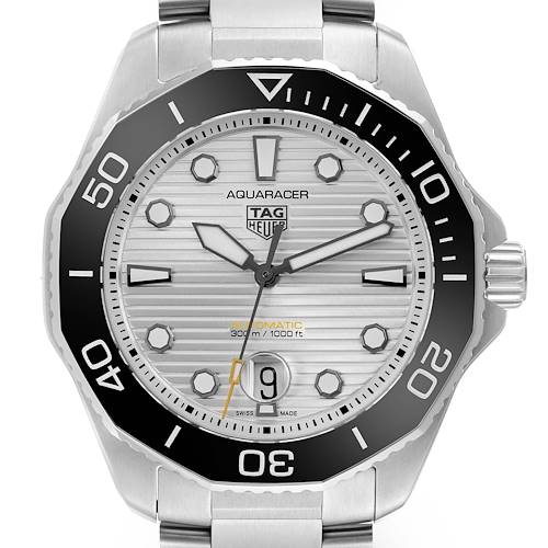 The Tag Heuer Aquaracer watch is shown from a front angle, displaying the face, bezel, and part of the bracelet.