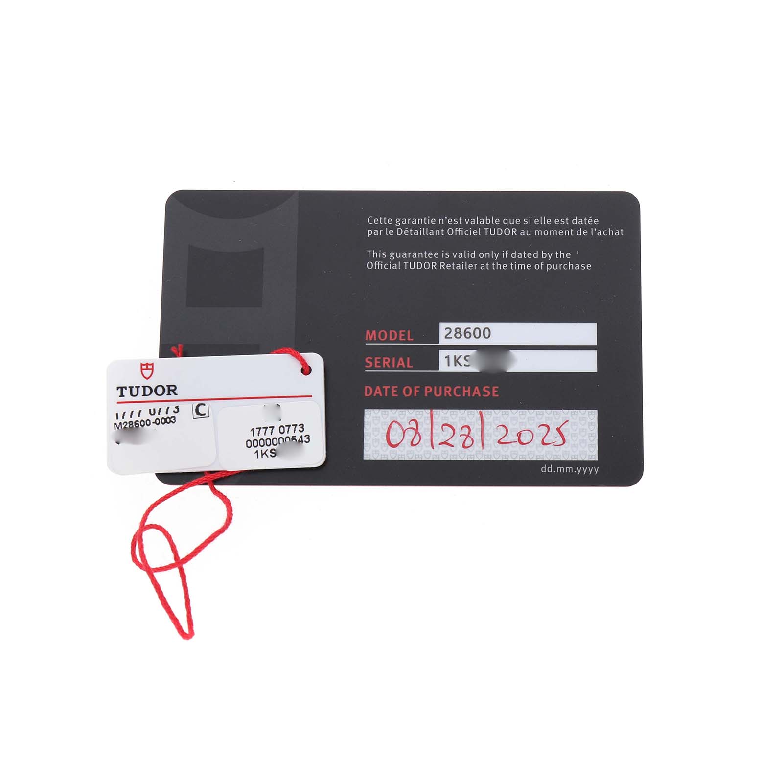 The image shows the guarantee card and tag for a Tudor Royal 28600-0003 Men's Stainless Steel Black Dial model watch.