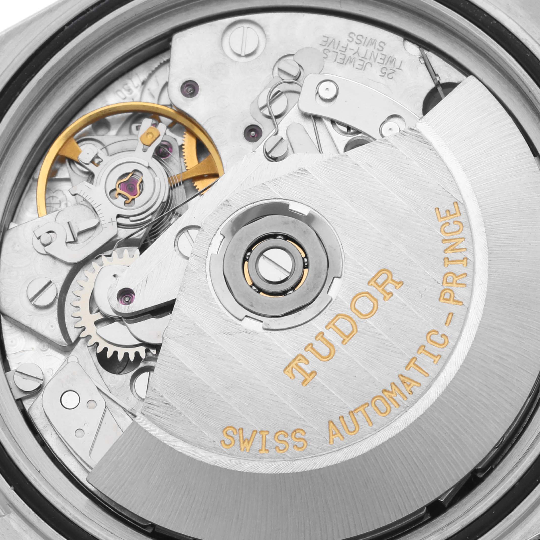 The image shows the internal movement of a Tudor Tiger 79280P Men's Stainless Steel Red Dial 79280P Men's Stainless Steel Red Dial model watch, highlighting the rotor and inner mechanisms.