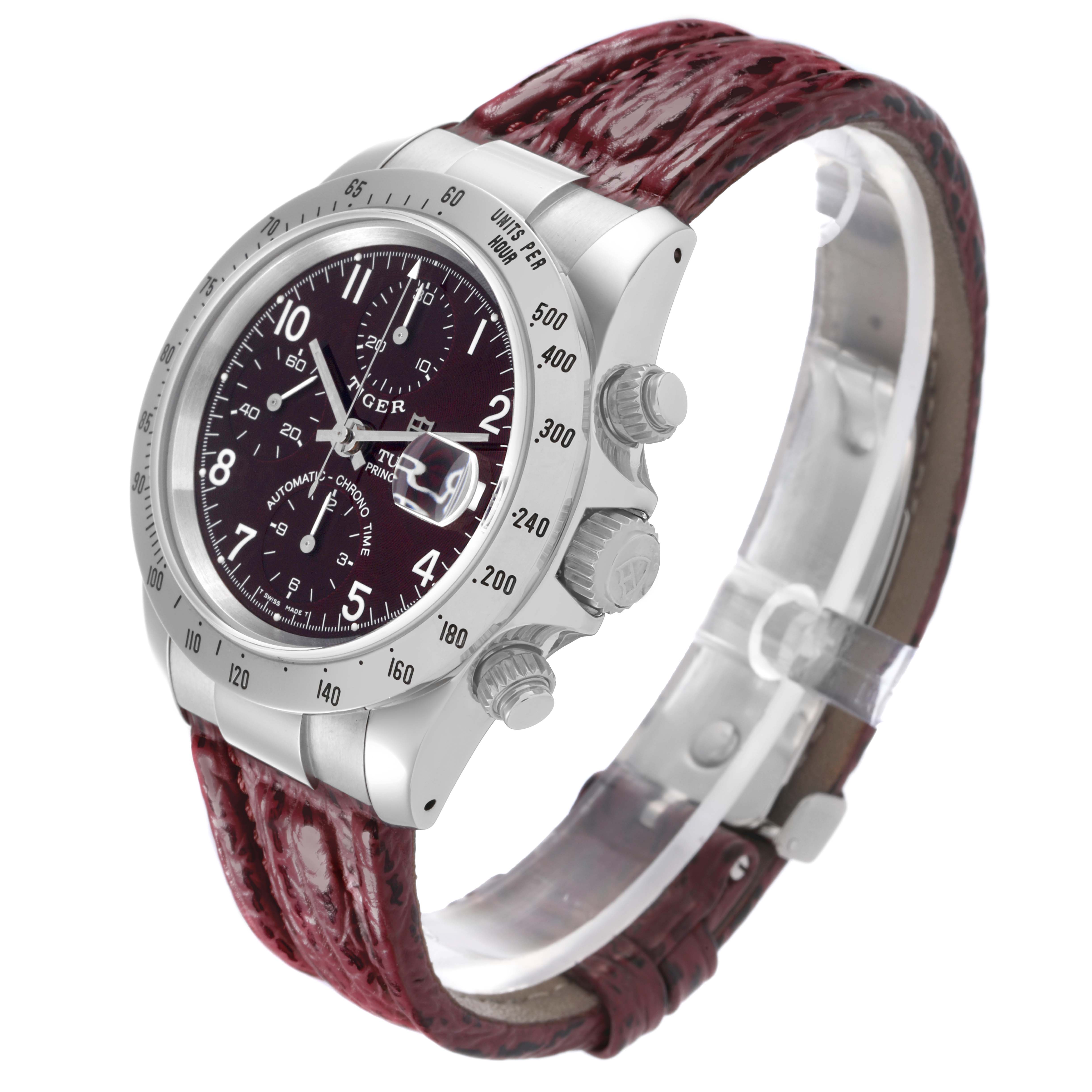 The Tudor Tiger 79280P Men's Stainless Steel Red Dial 79280P Men's Stainless Steel Red Dial watch is shown at an angled side view, highlighting its dial, crown, pushers, and red leather strap.
