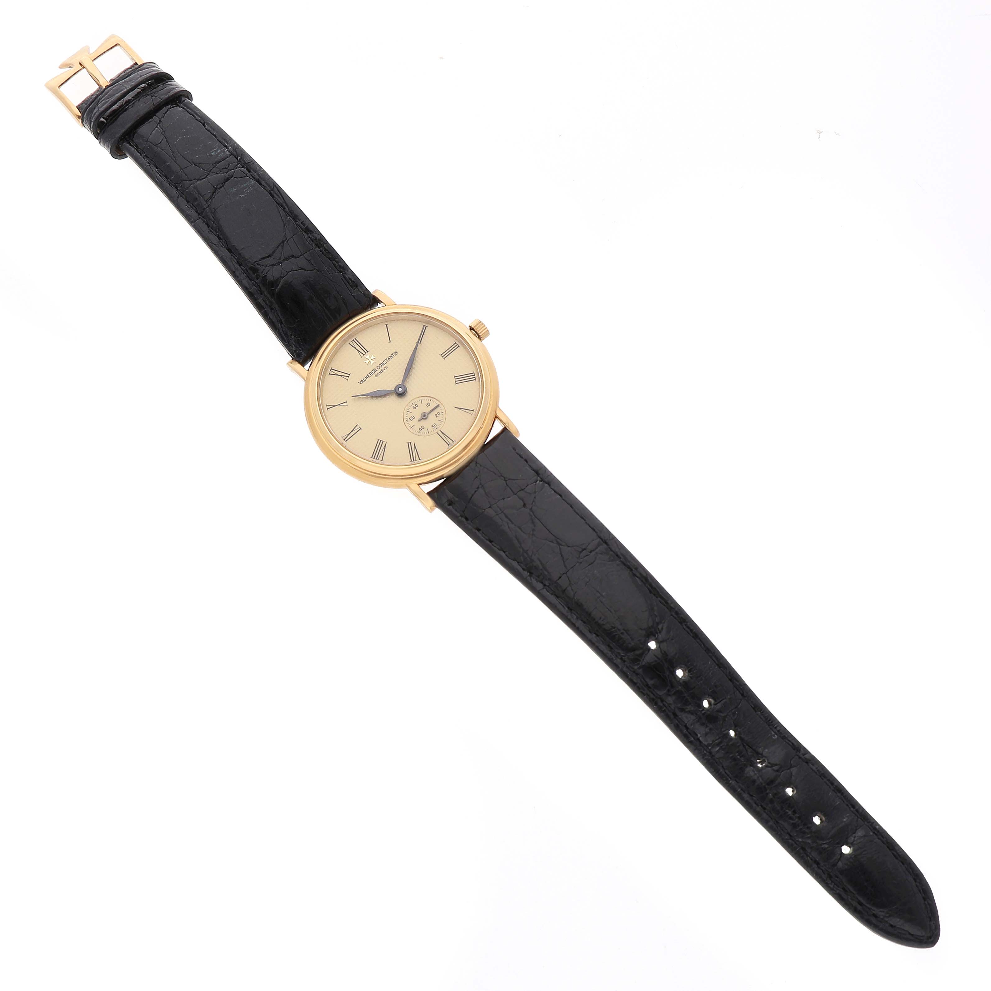 The Vacheron Constantin Patrimony 92238 Men's Yellow Gold Champagne Dial watch is shown in a top-down view, displaying the face, case, crown, and leather strap.