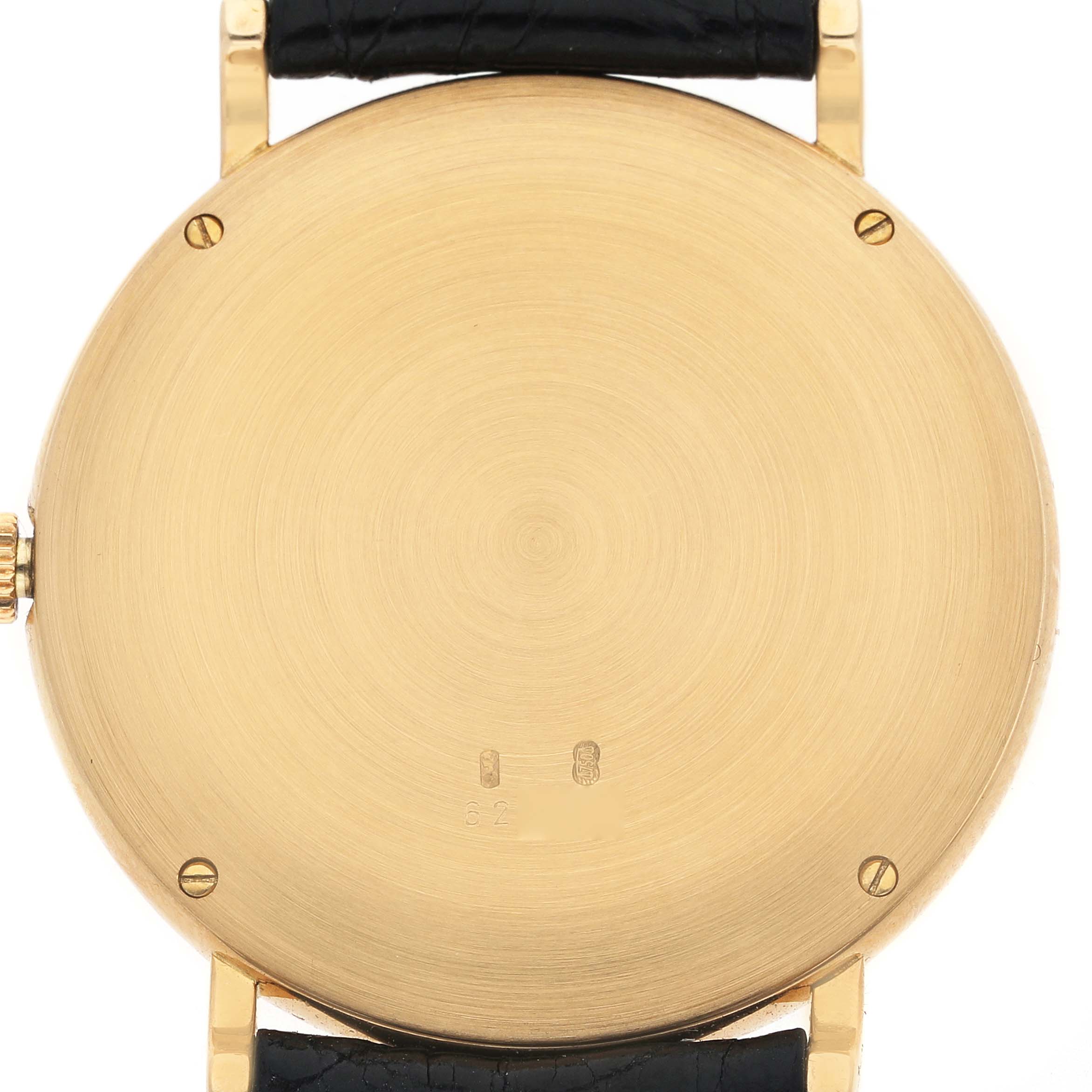 The image shows the back of a Vacheron Constantin Patrimony 92238 Men's Yellow Gold Champagne Dial watch, highlighting the gold case and black strap.