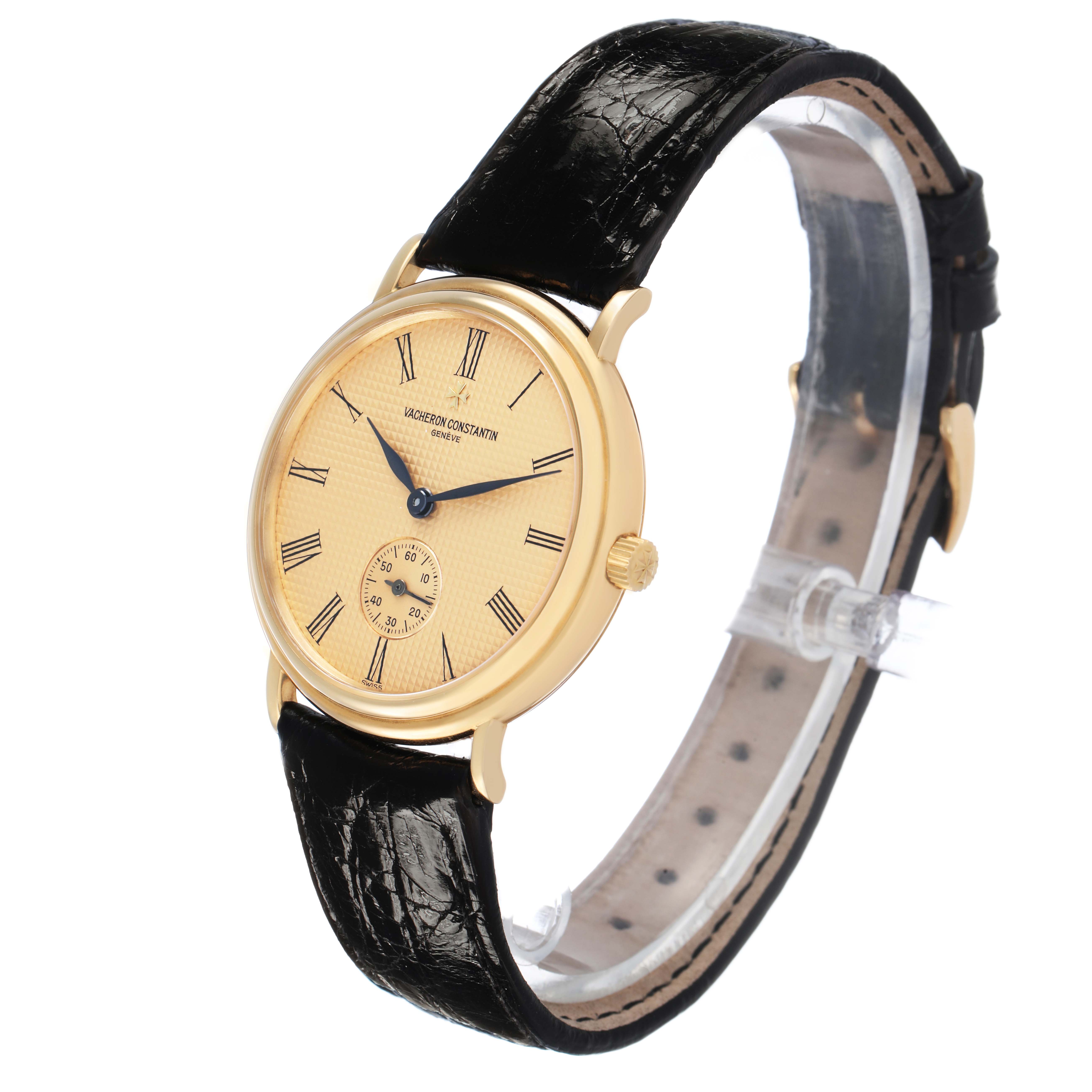 The Vacheron Constantin Patrimony 92238 Men's Yellow Gold Champagne Dial watch is shown at a slight angle, displaying the face, crown, and a black leather strap.