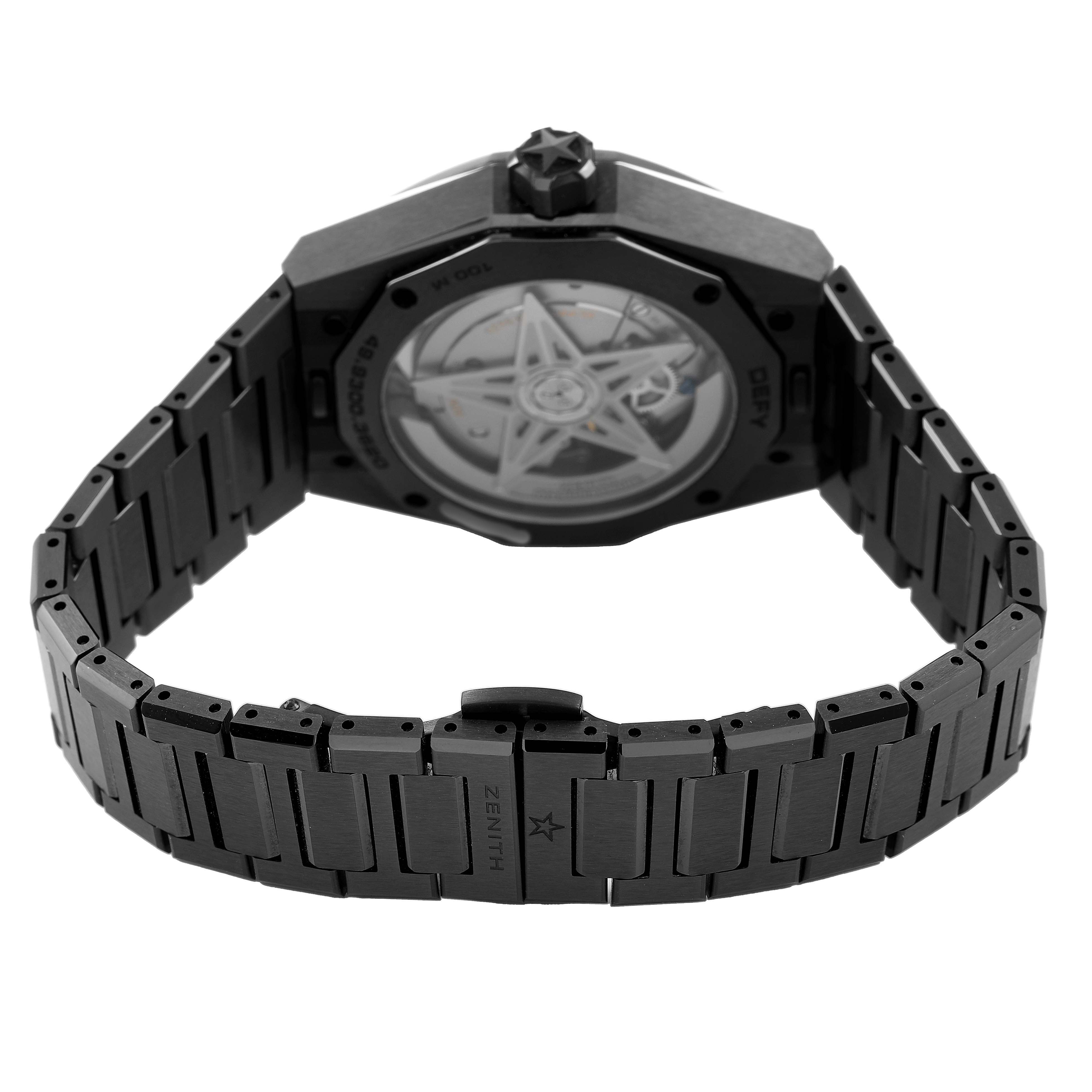 The image shows the Zenith Defy 49.9300.3620 Men's Ceramic Black Dial watch from the back, highlighting the open case back and metal bracelet.