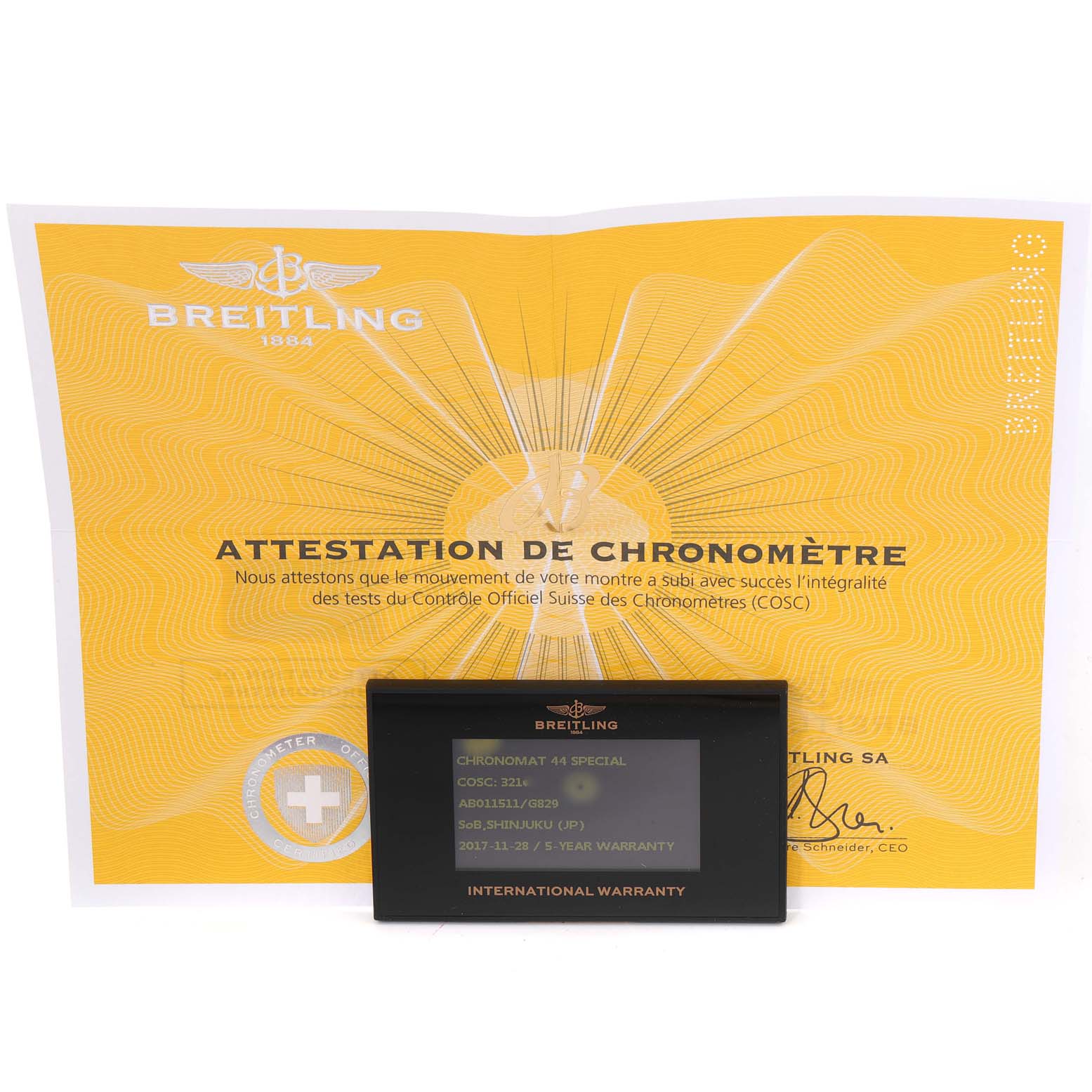 This image shows the warranty card and the chronometer certificate for a Breitling Chronomat AB0115 Men
s Stainless Steel Silver Dial AB0115 Men
s Stainless Steel Silver Dial 44 Special model.