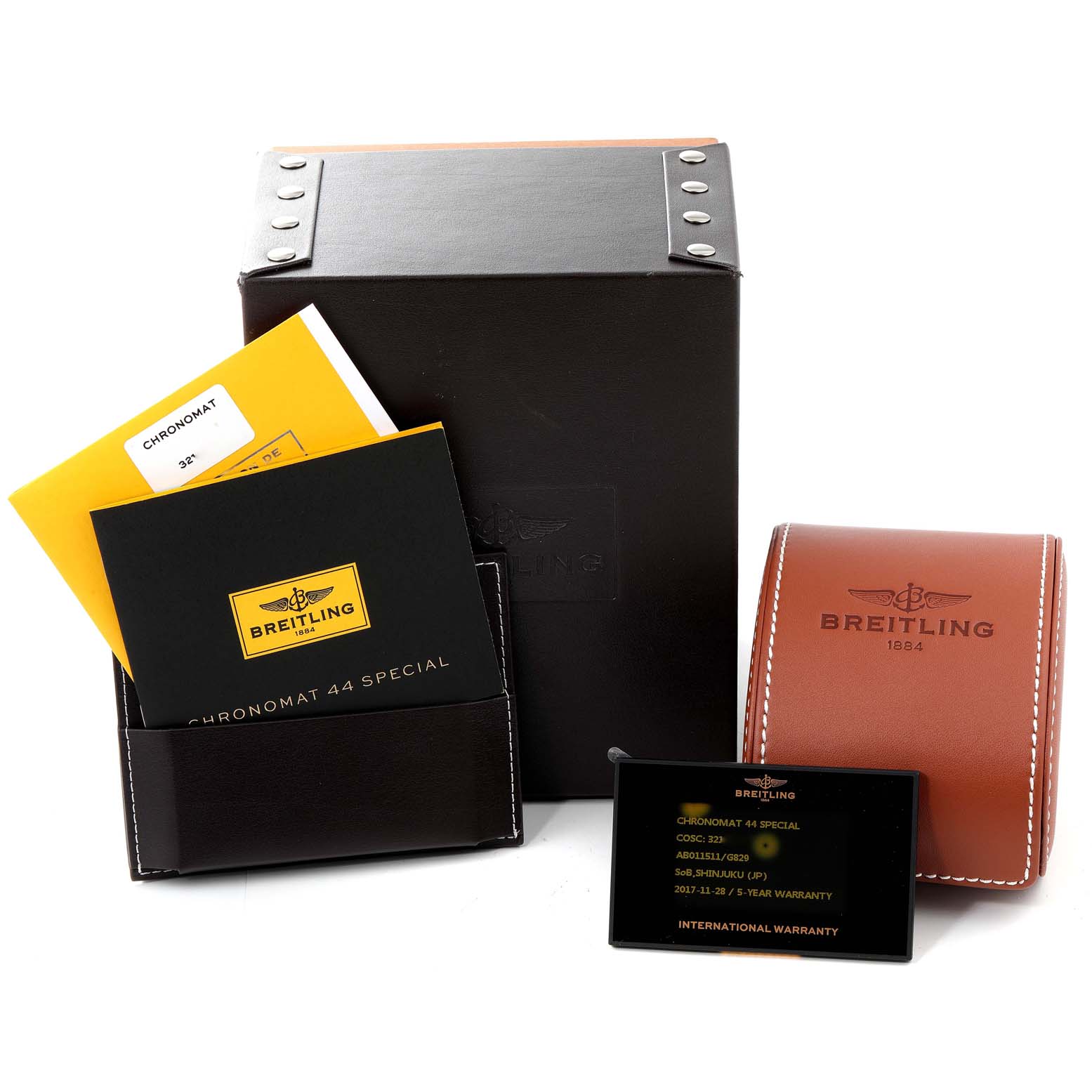 The image shows the packaging, warranty card, and manuals for a Breitling Chronomat AB0115 Men
s Stainless Steel Silver Dial AB0115 Men
s Stainless Steel Silver Dial watch.