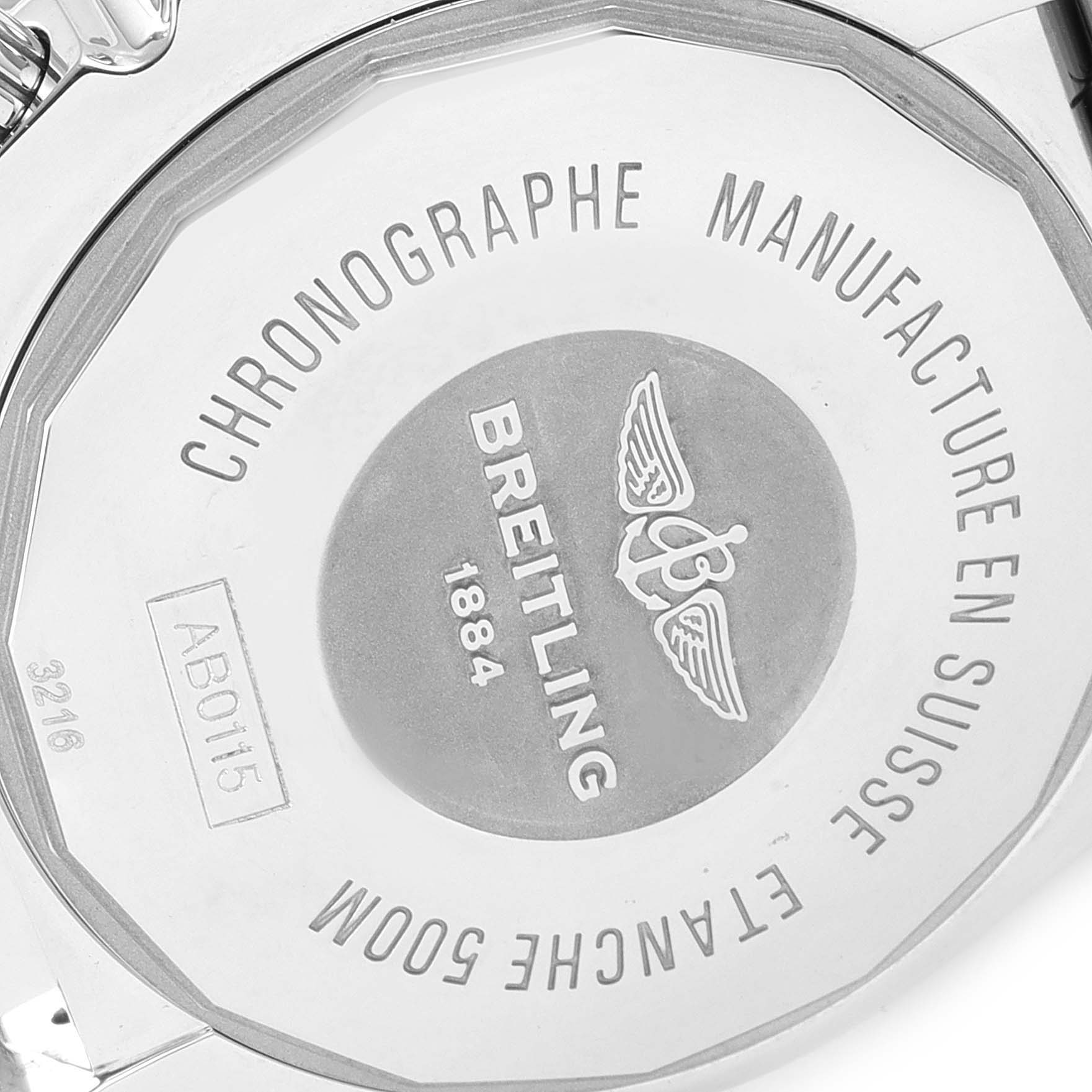 This image shows the case back of a Breitling Chronomat AB0115 Men
s Stainless Steel Silver Dial AB0115 Men
s Stainless Steel Silver Dial watch, highlighting engravings and branding details.