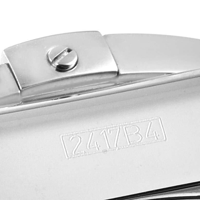 This close-up image shows the clasp and part of the band with the serial number 2417B4 of a Breitling Chronomat AB0115 Men
s Stainless Steel Silver Dial AB0115 Men
s Stainless Steel Silver Dial watch.