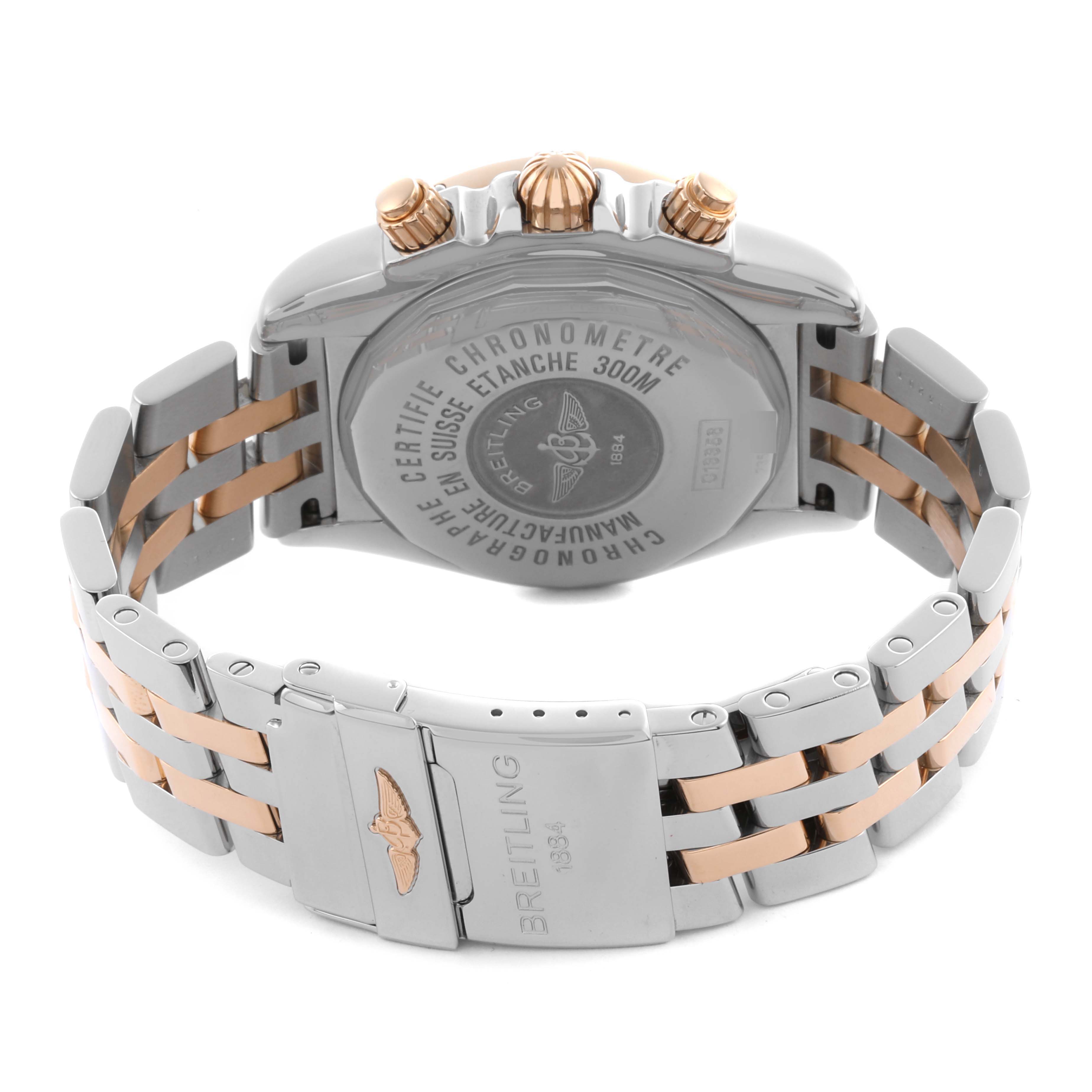 The Breitling Chronomat C1335653/B821 Men's Steel and Gold (two tone) Black Dial C1335653/B821 Men's Steel and Gold (two tone) Black Dial watch is shown from the rear, displaying the case back, crown, pushers, and two-tone bracelet with clasp.