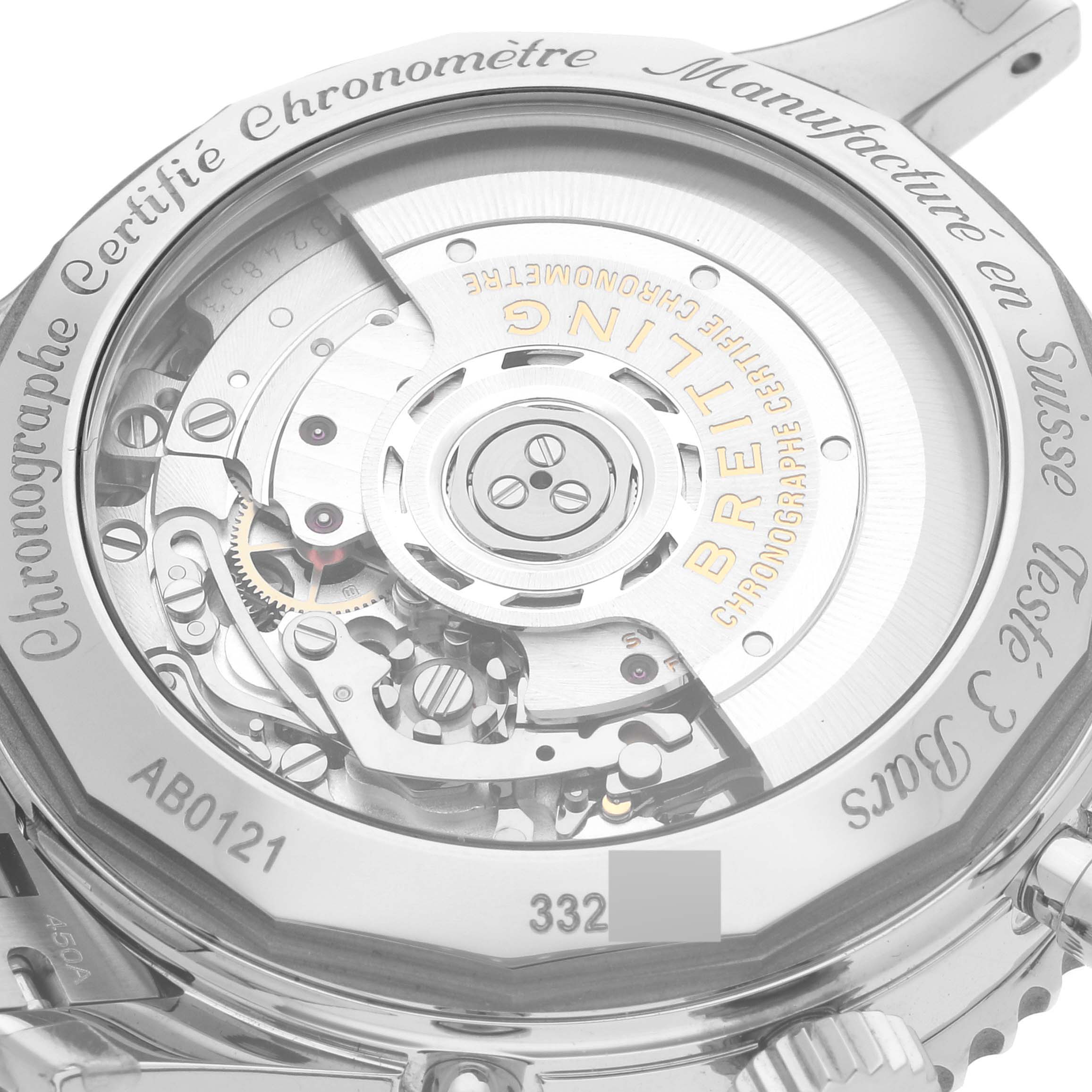 This image shows the back view of a Navitimer model by Breitling, displaying the intricate mechanical movement.