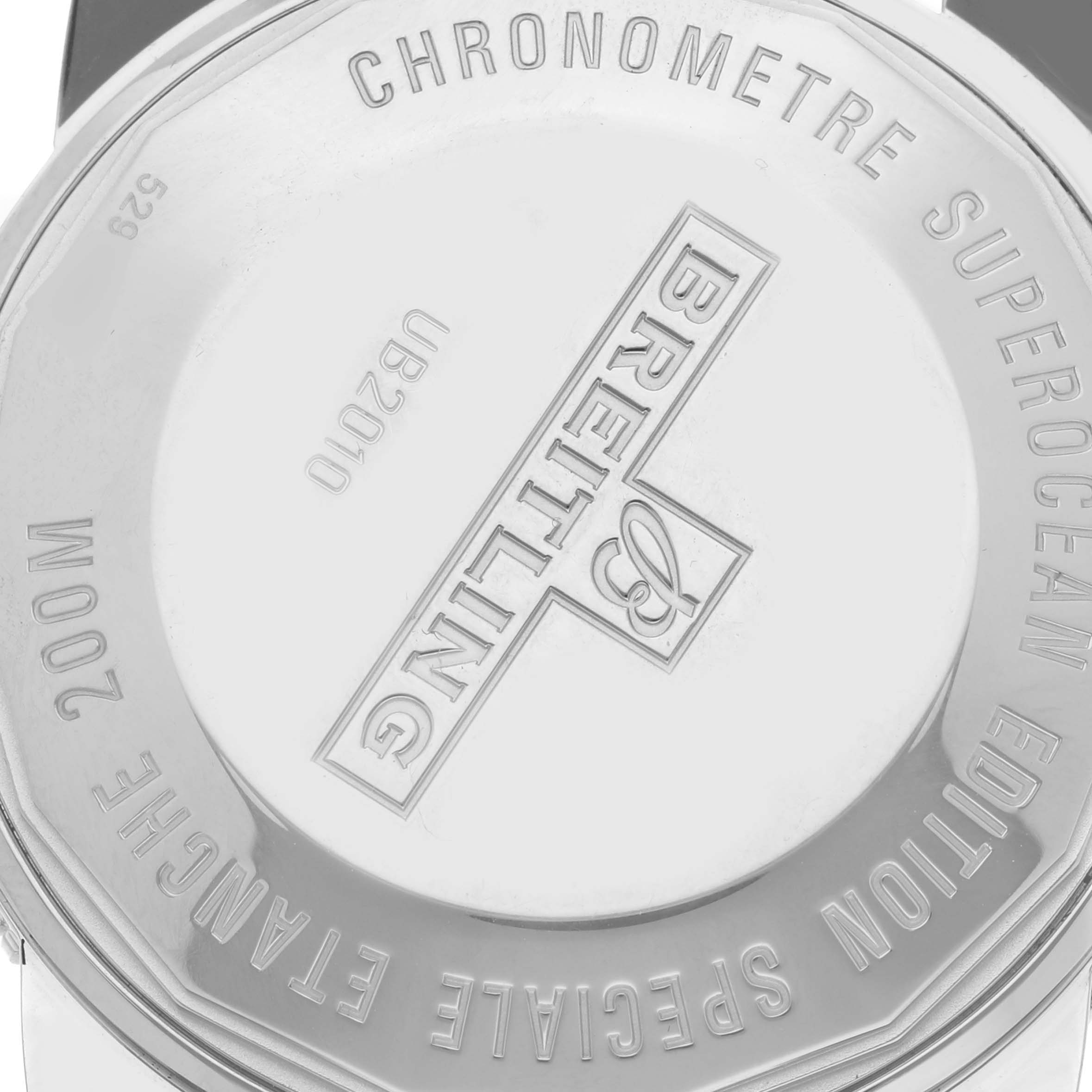 The image shows the back case of the Breitling Superocean UB2010161C1A1 Men's Stainless Steel Blue Dial UB2010161C1A1 Men's Stainless Steel Blue Dial watch, highlighting the engravings and brand logo.