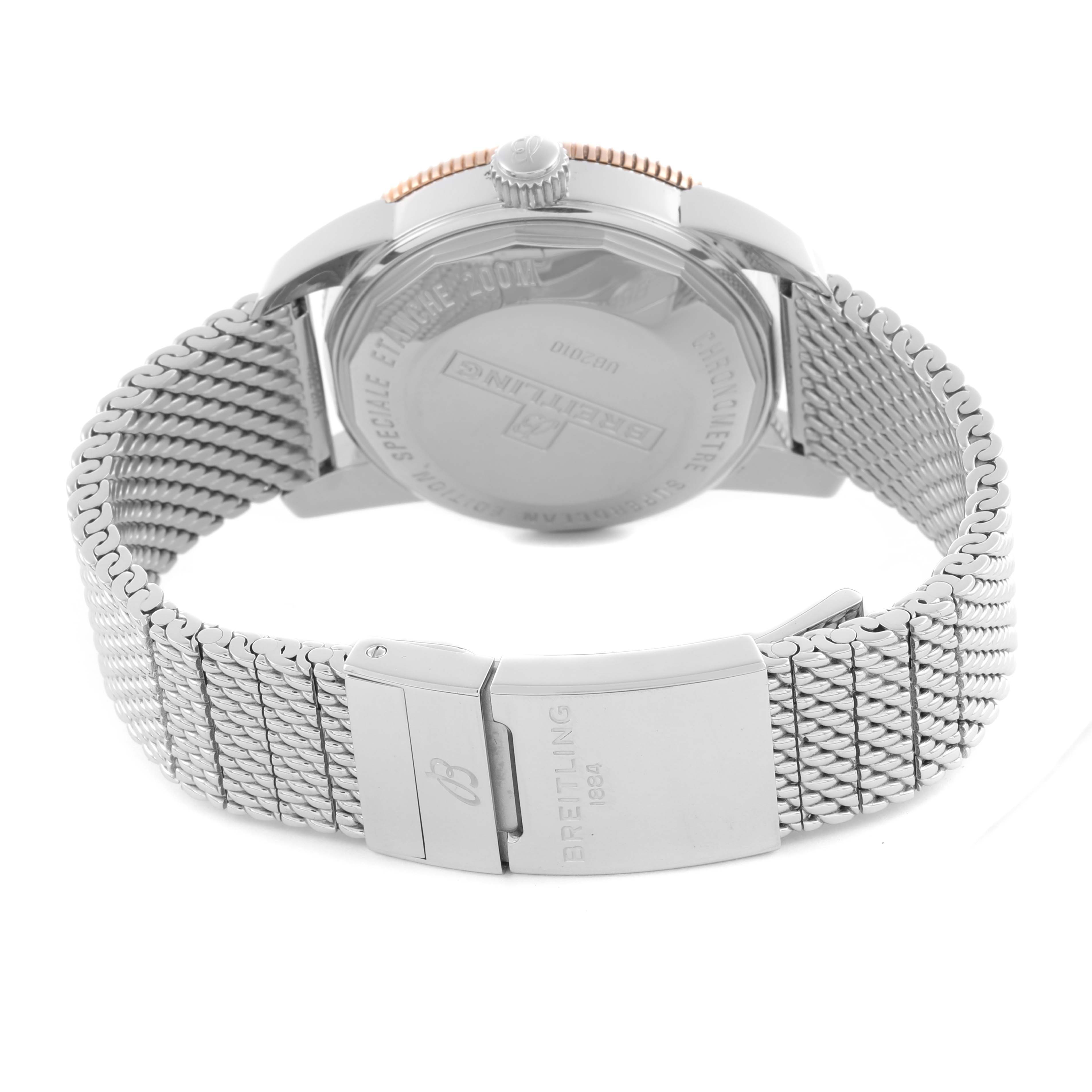 The Breitling Superocean UB2010161C1A1 Men's Stainless Steel Blue Dial UB2010161C1A1 Men's Stainless Steel Blue Dial is shown from the back, highlighting the case back and metal mesh bracelet with clasp.