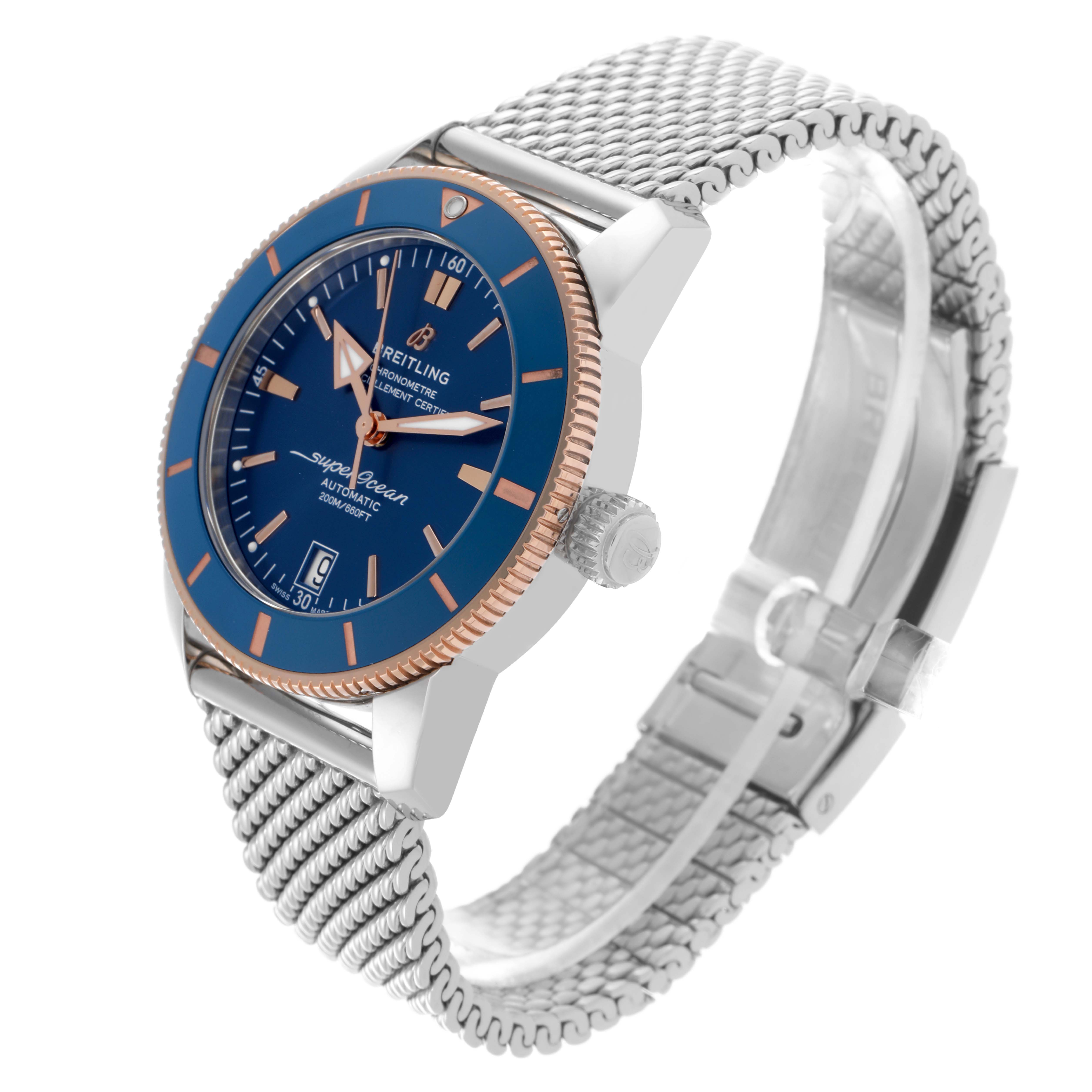 The Breitling Superocean UB2010161C1A1 Men's Stainless Steel Blue Dial UB2010161C1A1 Men's Stainless Steel Blue Dial watch is shown at a slight angle, displaying the dial, bezel, crown, and mesh bracelet.