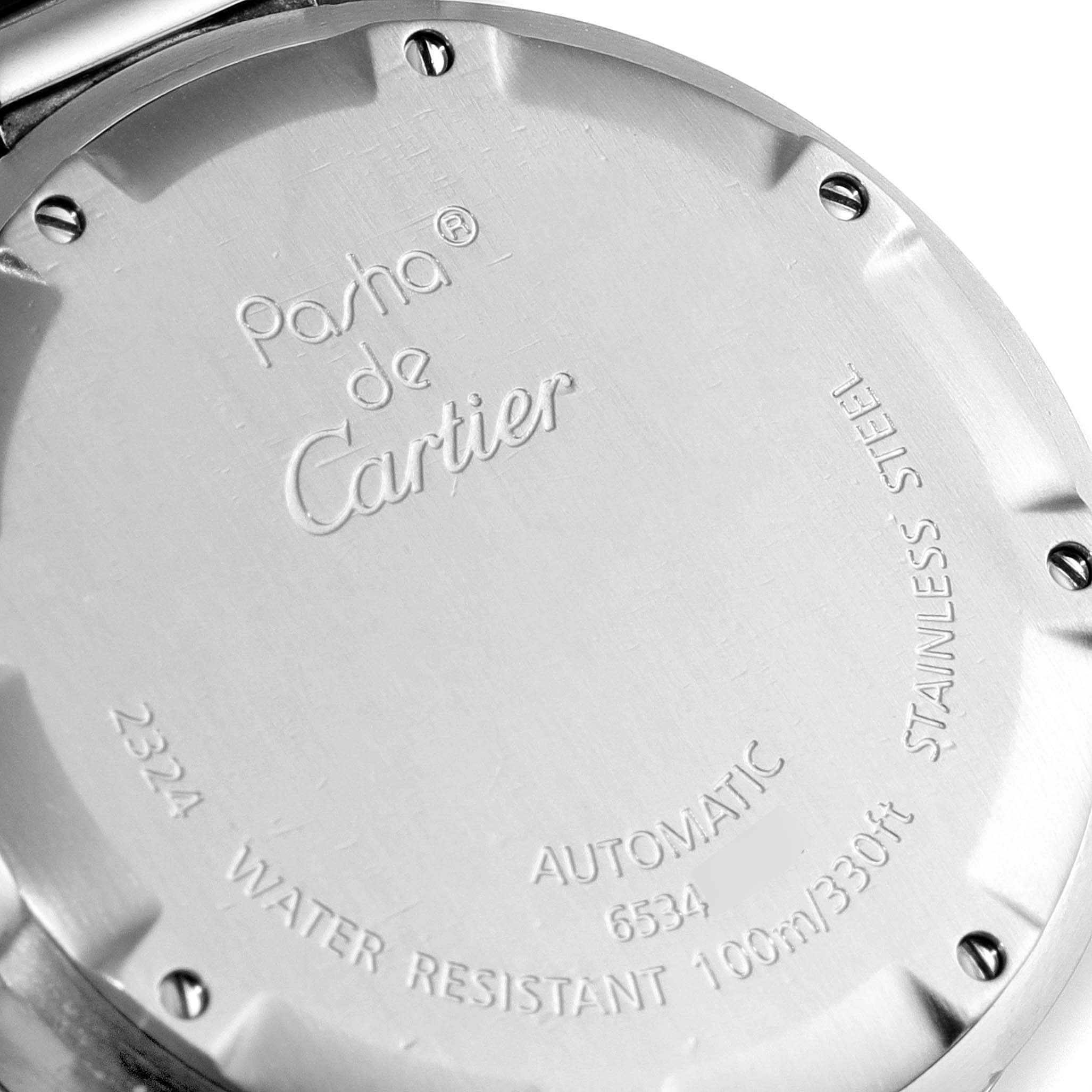 This image shows the back case of a Pasha de Cartier watch, engraved with model details and specifications.