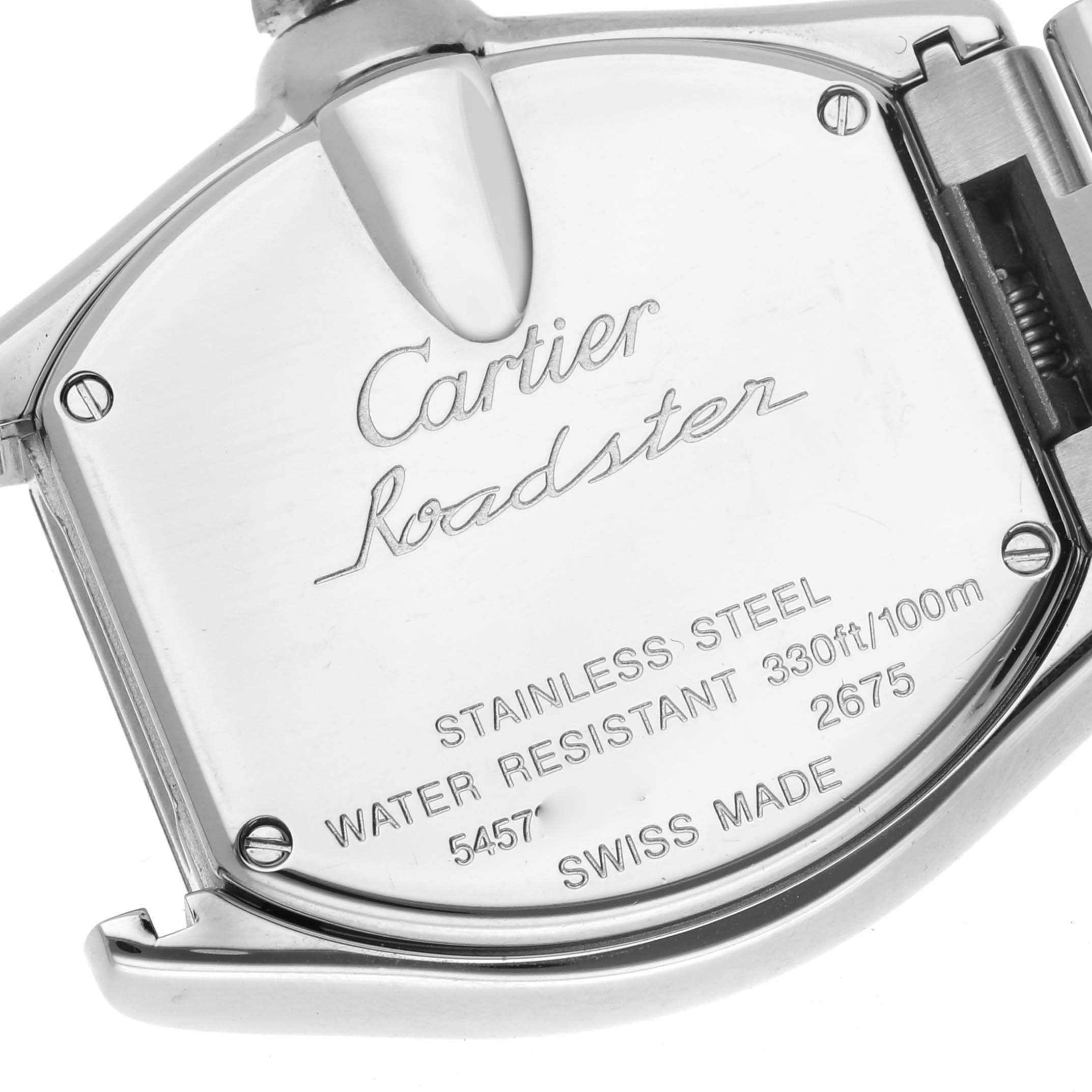 The image shows the back of a Cartier Roadster W62016V3 Women
s Stainless Steel Silver Dial W62016V3 Women
s Stainless Steel Silver Dial watch, highlighting its engraved details and clasp.