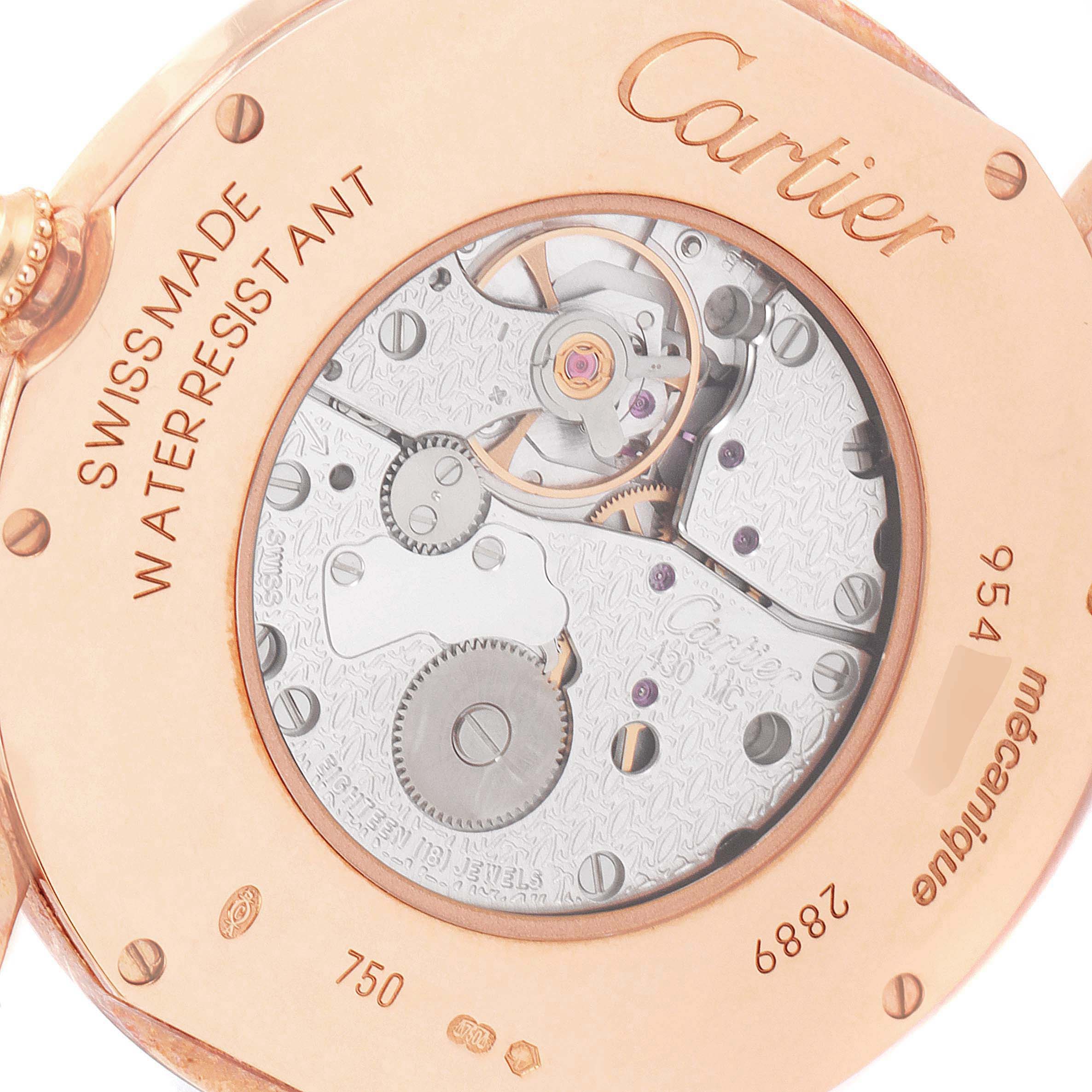 The image shows a detailed close-up of the back of a Cartier Ronde W6800251 Men's Rose Gold Silver Dial watch, displaying the mechanical movement and engravings.