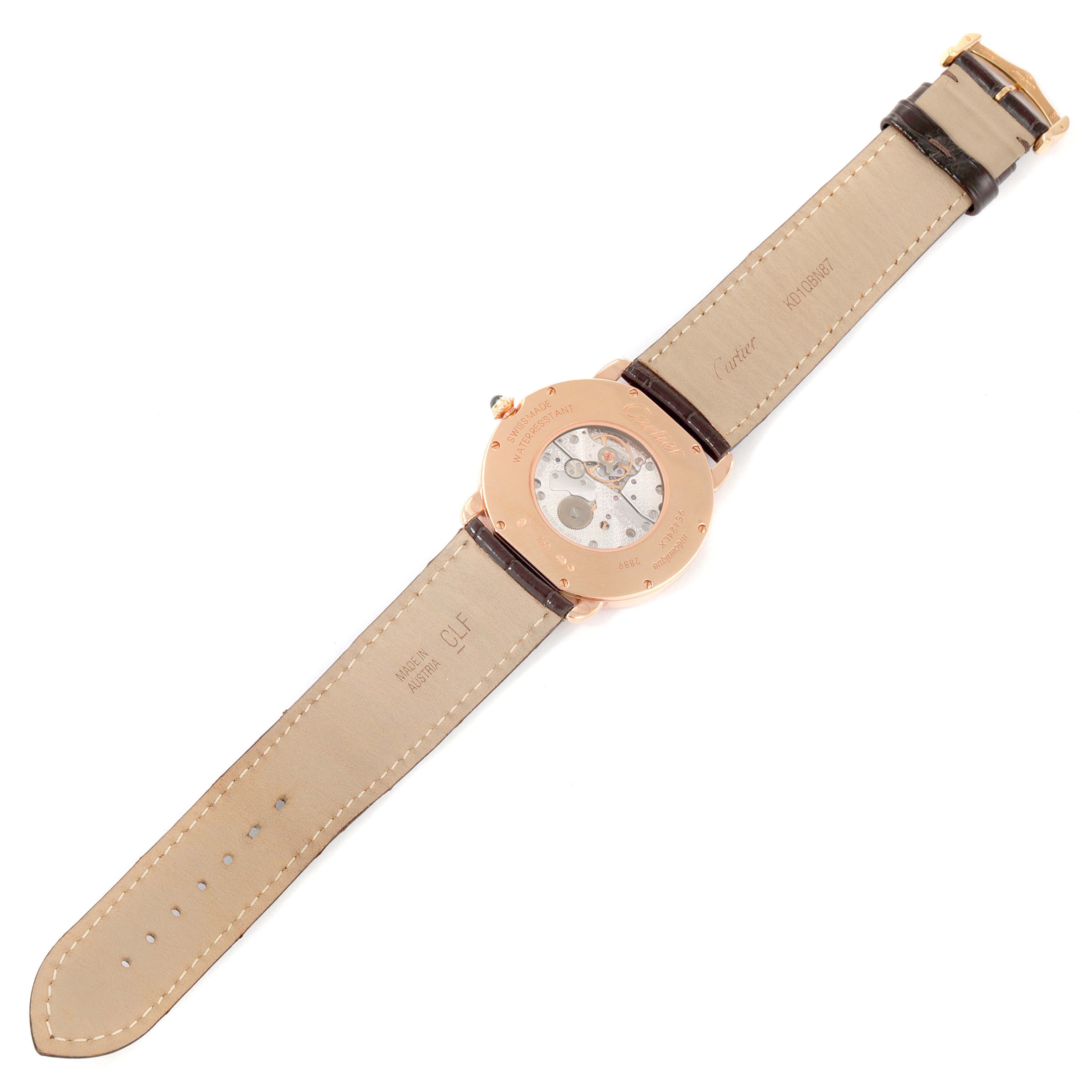 The image shows the back of a Cartier Ronde W6800251 Men's Rose Gold Silver Dial watch, highlighting the transparent case back and leather strap.