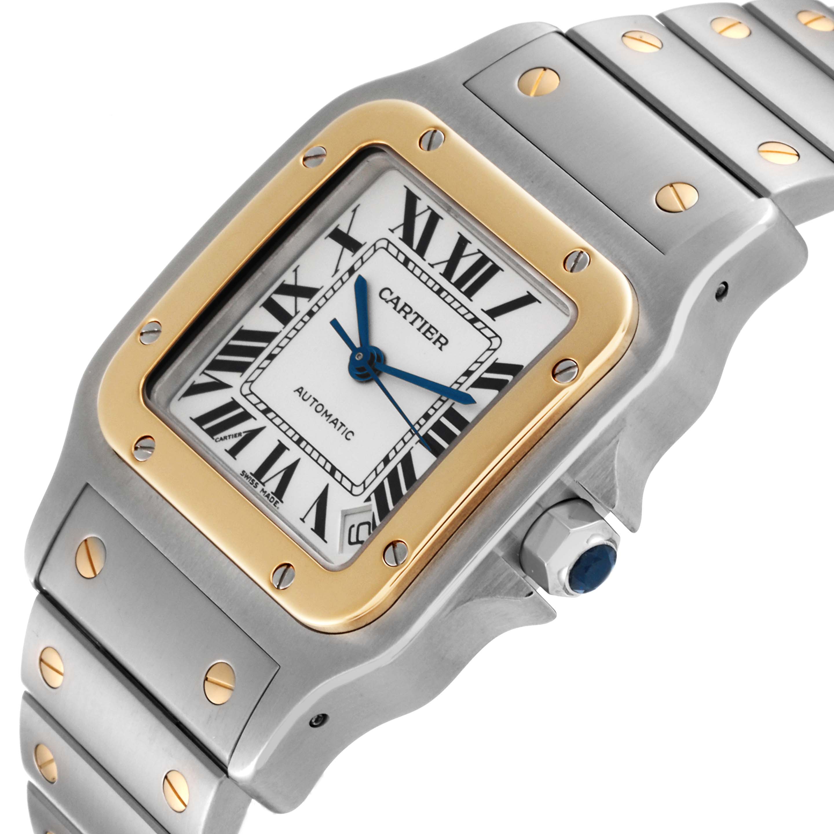 The image shows a close-up angle of the Cartier Santos W20099C4 Men
s Steel and Gold (two tone) Silver Dial W20099C4 Men
s Steel and Gold (two tone) Silver Dial watch, highlighting the dial, bezel, crown, and part of the bracelet.