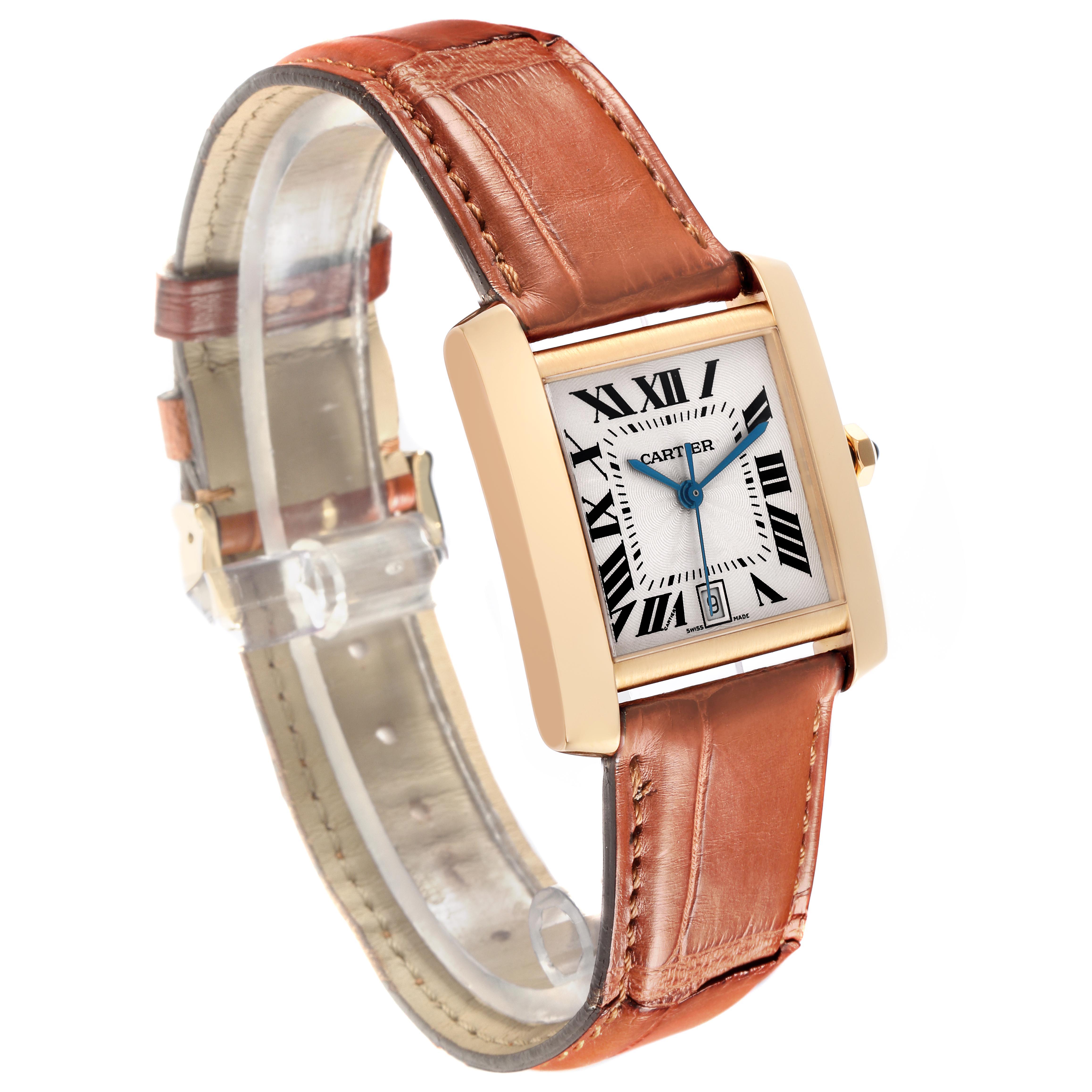 The Cartier Tank Francaise W5000156 Men's Yellow Gold Silver Dial W5000156 Men's Yellow Gold Silver Dial watch is shown at a three-quarter angle, highlighting its rectangular case, leather strap, and Roman numeral dial.