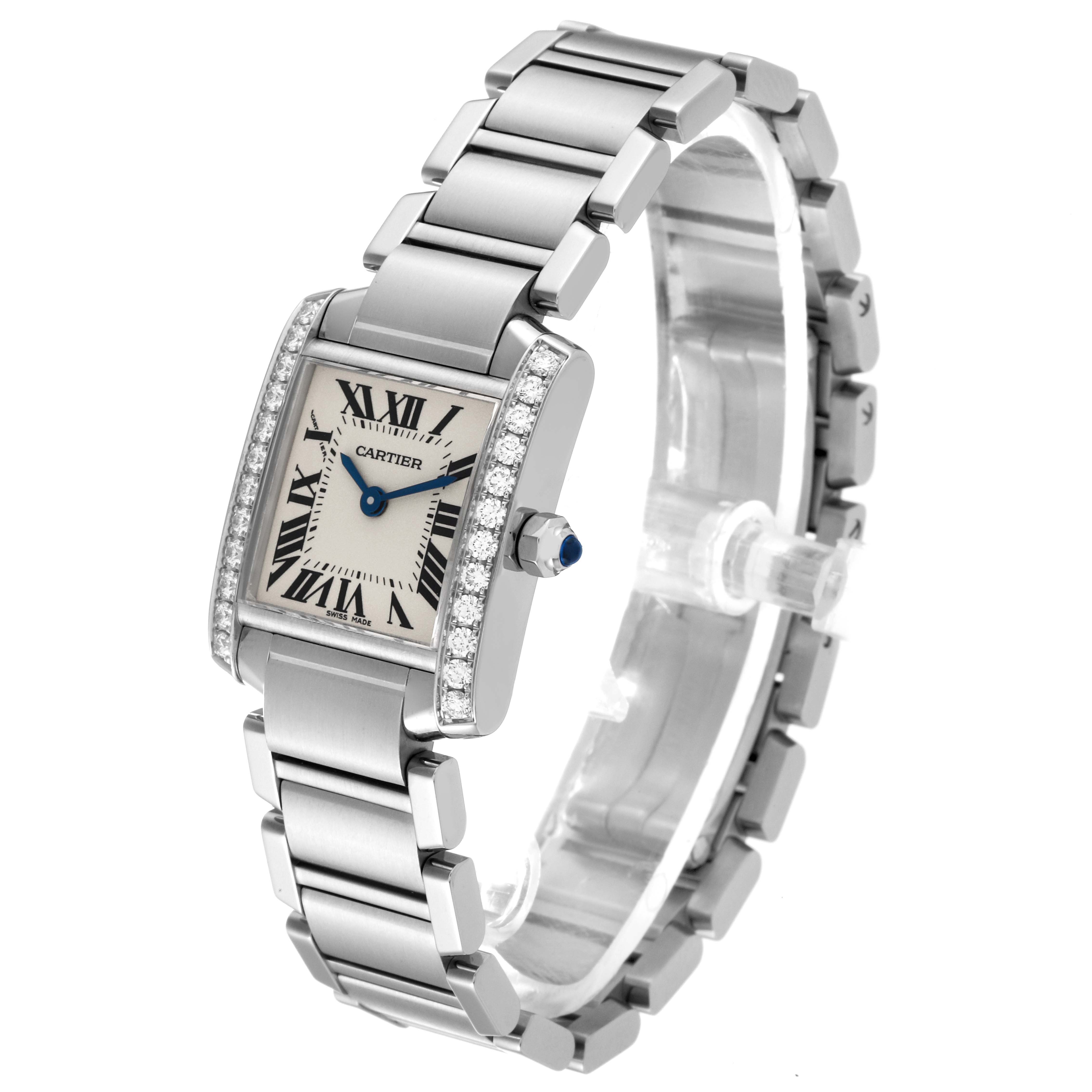 This image shows a Cartier Tank Francaise W4TA0008 Women
s Stainless Steel Silver Dial W4TA0008 Women
s Stainless Steel Silver Dial watch at an angle displaying the face, bracelet, and side profile with a blue cabochon crown.