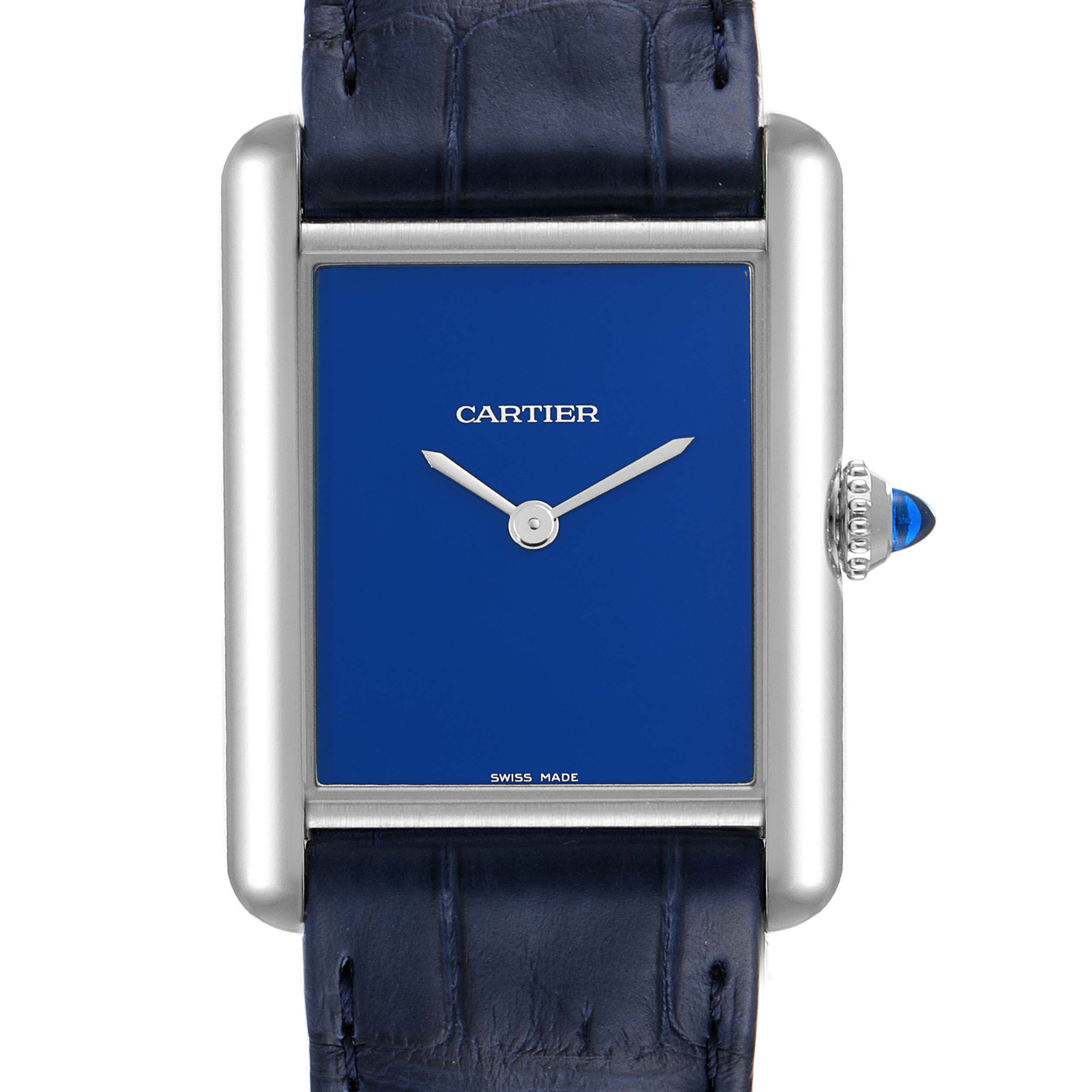 This image shows the face of a Cartier Tank Must WSTA0055 Women's Stainless Steel Blue Dial WSTA0055 Women's Stainless Steel Blue Dial watch, highlighting the blue dial, hands, and part of the strap.