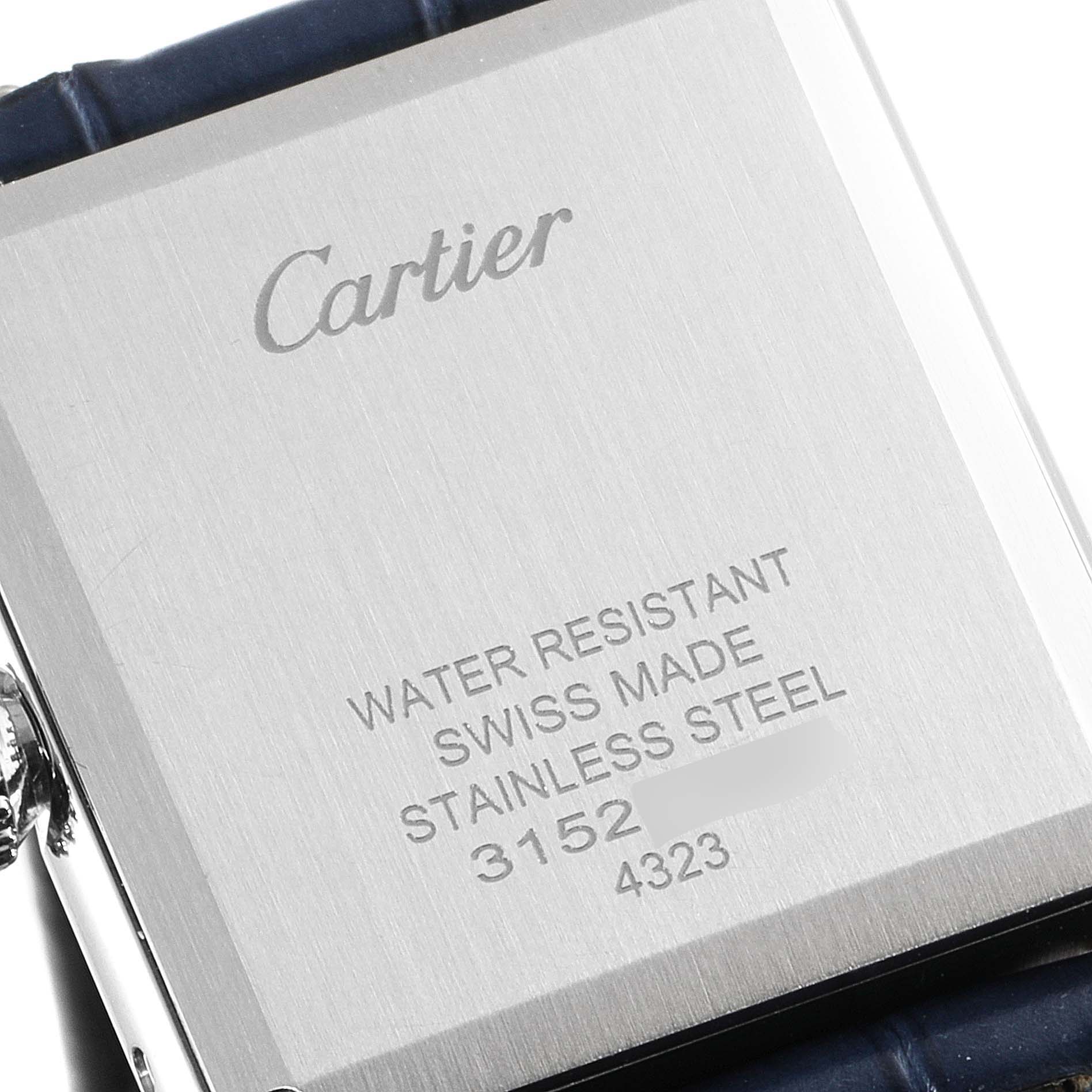 This image shows the back of a Tank Must model watch by Cartier, highlighting its water resistance and material details.
