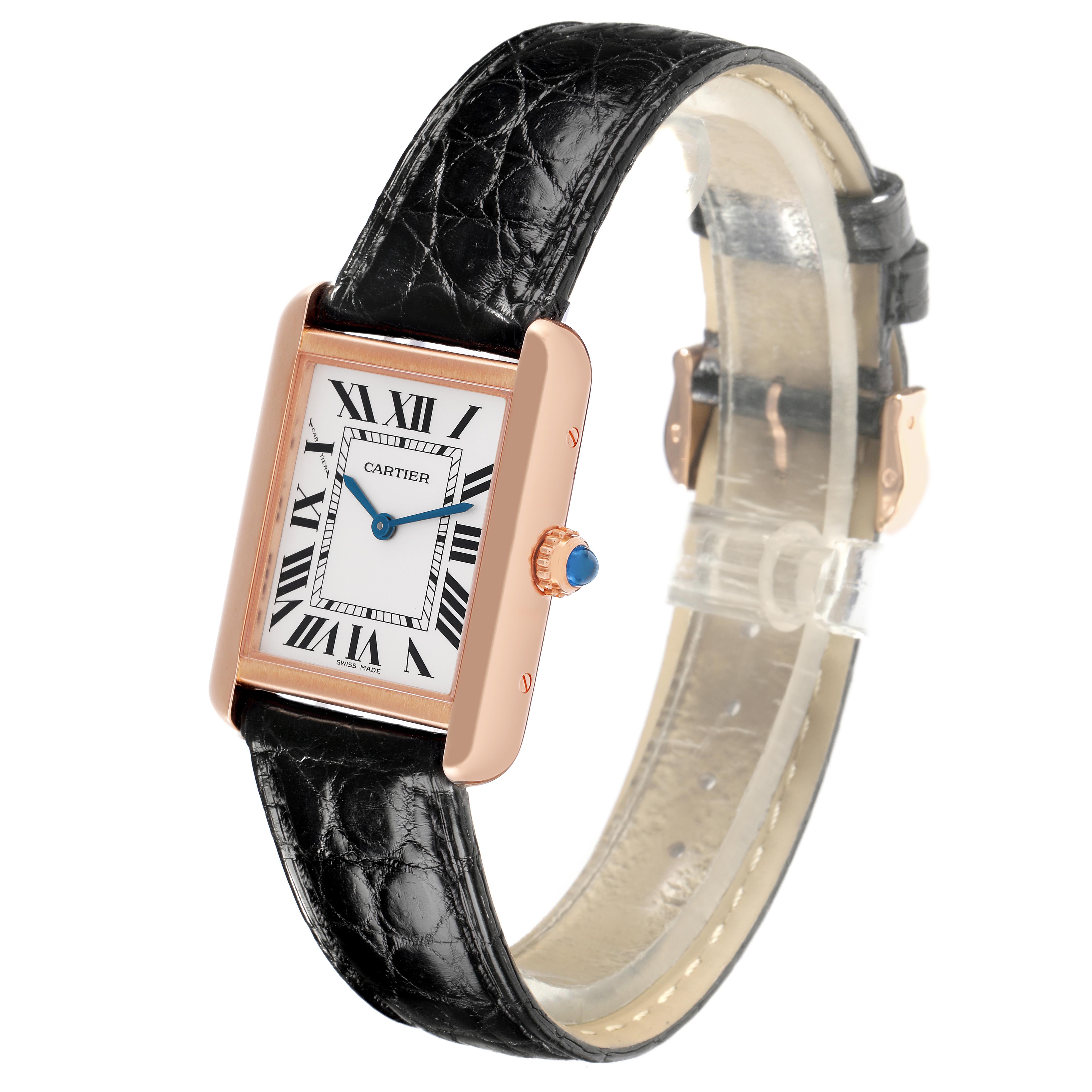 The Cartier Tank Solo W5200024 Women's Steel and Gold (two tone) Silver Dial W5200024 Women's Steel and Gold (two tone) Silver Dial watch is shown at a slight angle, displaying the face, case side, strap, and crown with a blue cabochon.