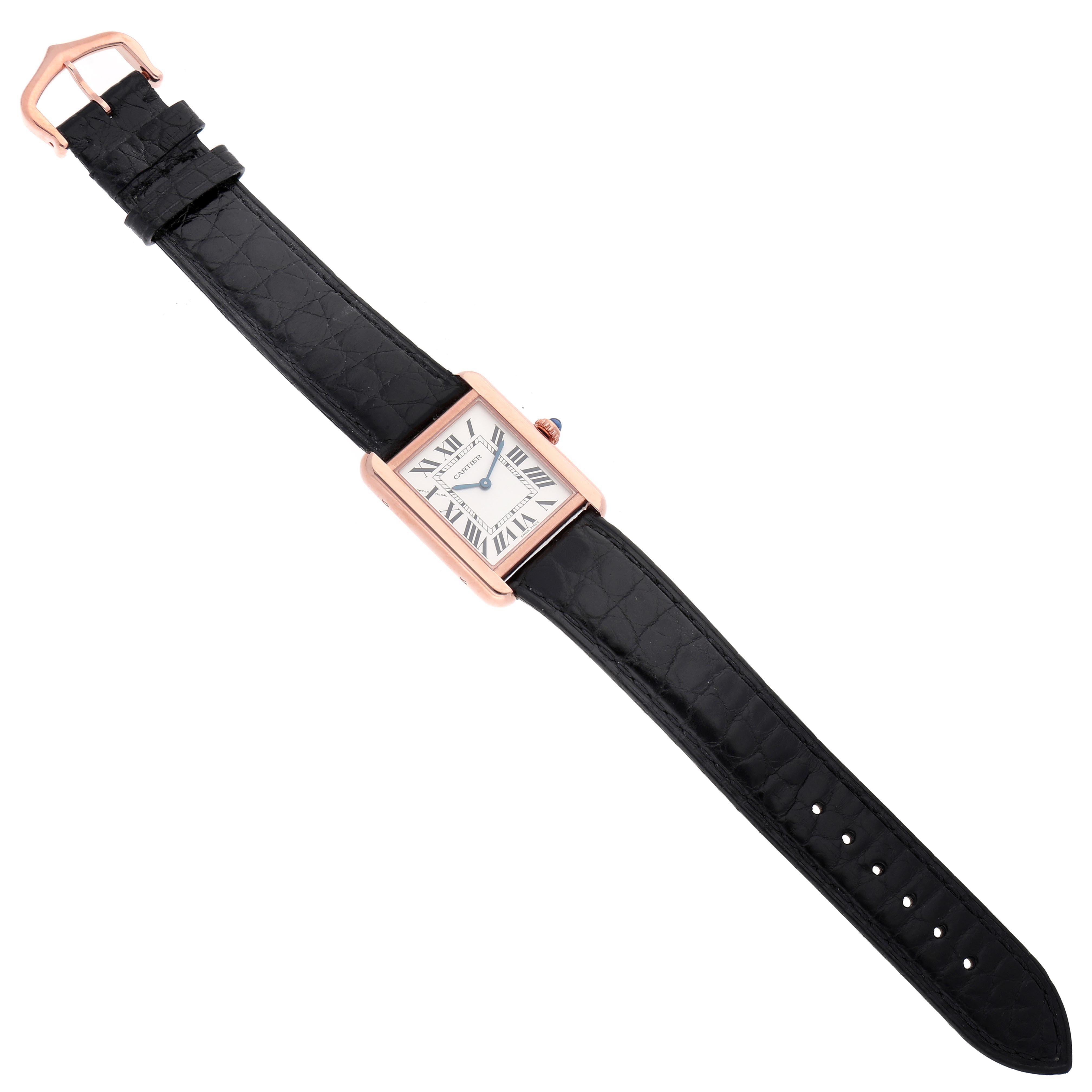 The Cartier Tank Solo W5200024 Women's Steel and Gold (two tone) Silver Dial W5200024 Women's Steel and Gold (two tone) Silver Dial watch is shown from a top-down angle, displaying the face, case, strap, and buckle.