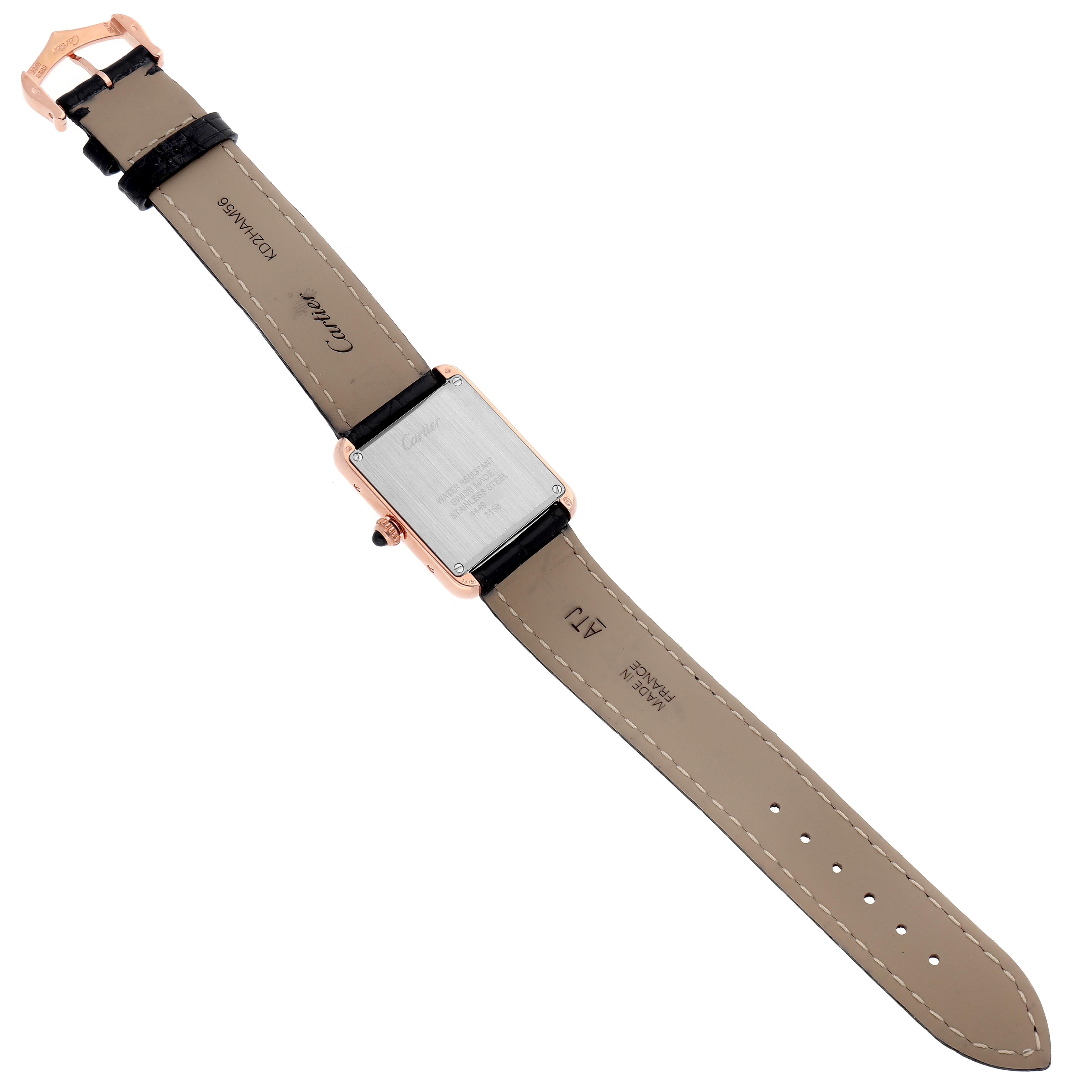 The Cartier Tank Solo W5200024 Women's Steel and Gold (two tone) Silver Dial W5200024 Women's Steel and Gold (two tone) Silver Dial watch is shown from the back, displaying the case back, leather strap, and buckle.