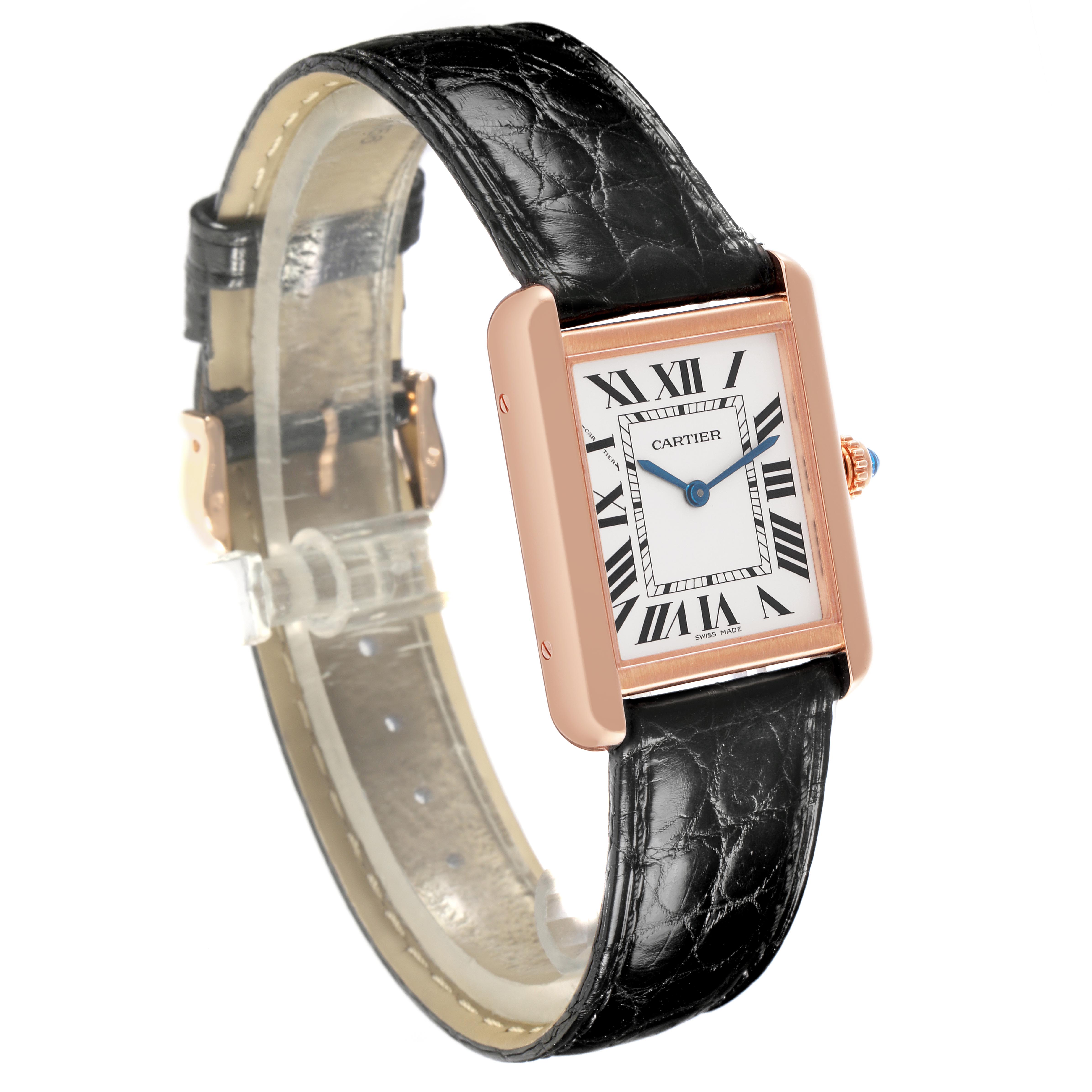 The Cartier Tank Solo W5200024 Women's Steel and Gold (two tone) Silver Dial W5200024 Women's Steel and Gold (two tone) Silver Dial is shown at a three-quarter angle, highlighting its rectangular face, Roman numeral dial, and leather strap.